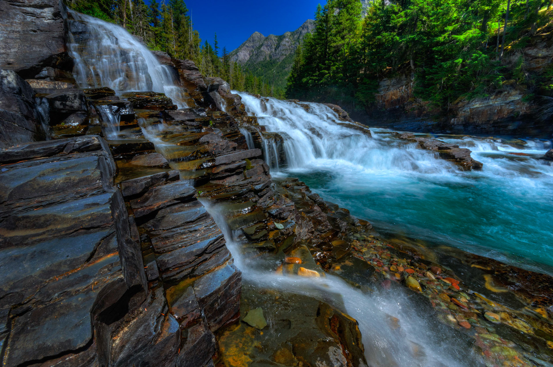 Unnamed cascades on McDonald Creek.Glacier National ParkJuly 31, 2015This is an HDR image consisting of 5 exposures merged in Photomatix Pro. Additional processing in Lightroom and Photoshop.PENTAX K-3, Sigma 10-20mm f/4-5.6 EX DCISO 100 10 mm  ¹⁄₁₃ sec at ƒ / 22