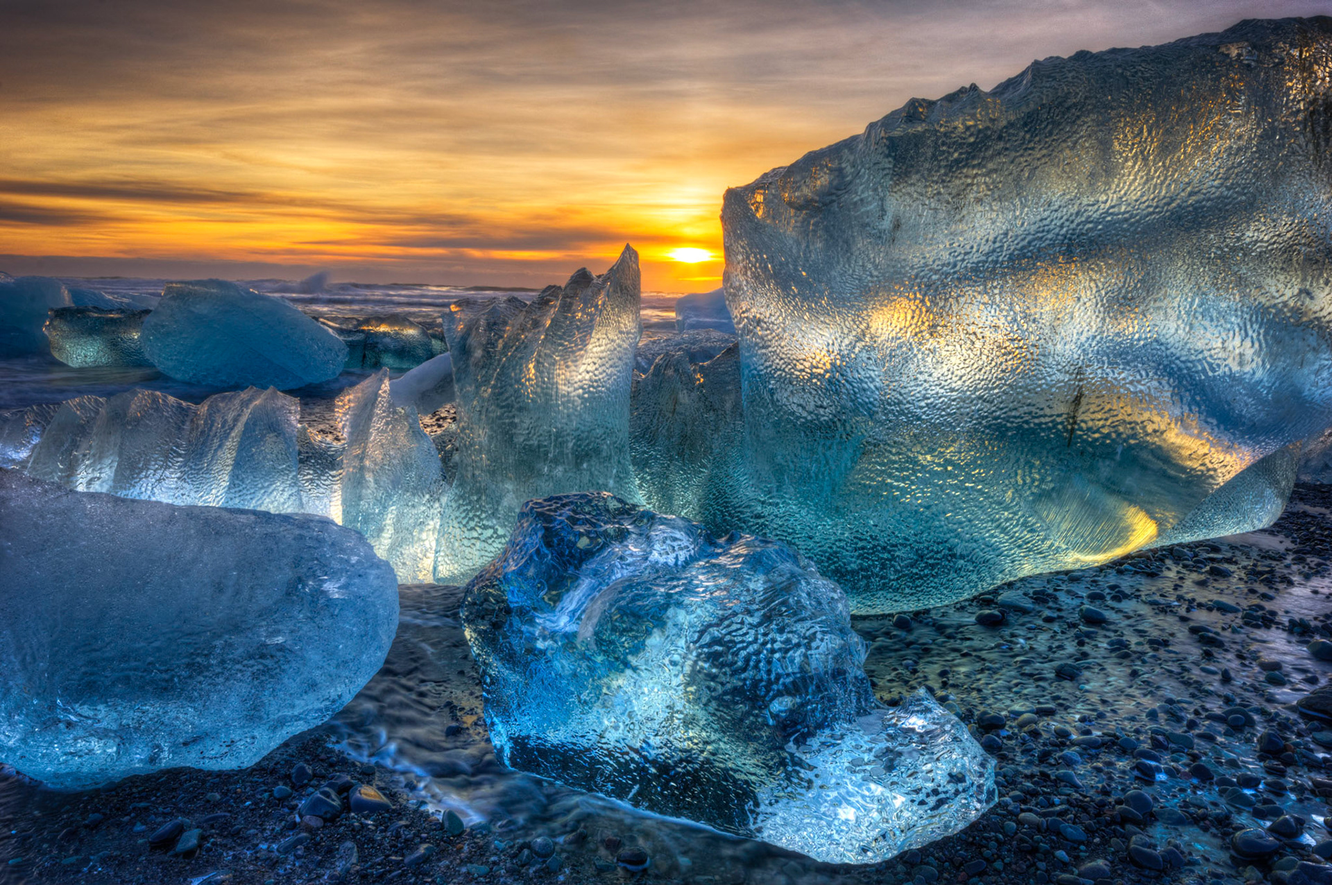 Sunrise at the ice beach at the outlet of Jökullsárlón.Austurland, IcelandFebruary 2, 2016PENTAX K-3, Sigma 10-20mm f/4-5.6 EX DCISO 100 16 mm  ⅙ sec at ƒ / 18