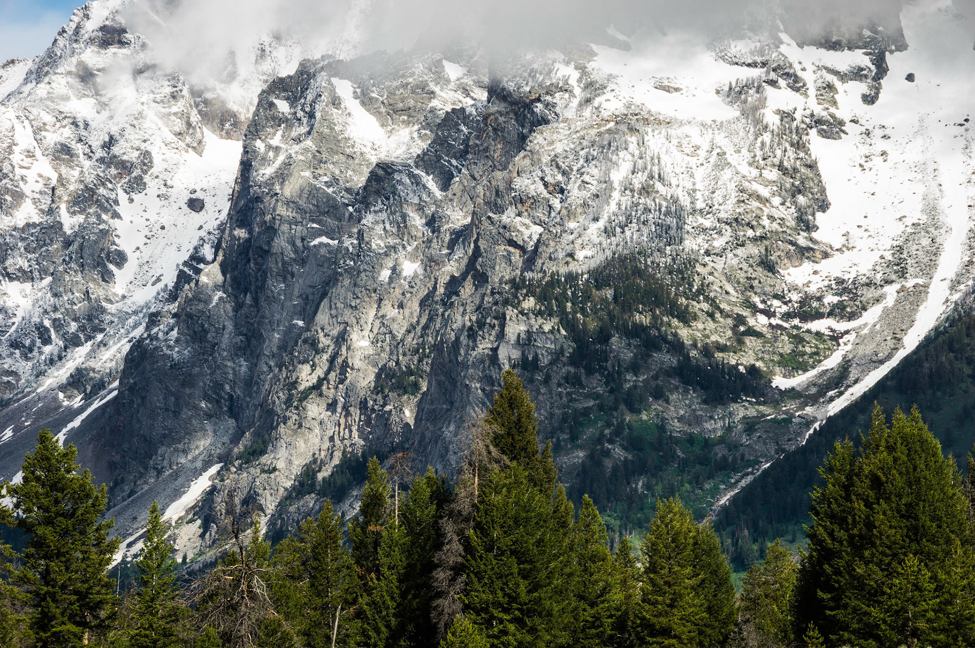 The lower slopes of Mount Moran.Grand Teton National Park17 June 2014PENTAX K-3, Sigma 18-250mm f/3.5-6.3 DC OS HSMISO 100 95 mm  ¹⁄₁₀₀ sec at ƒ / 11Prints of my work are available from my website at http://www.fingolfinphoto.comFollow me on Facebook at http://www.facebook.com/fingolfinphoto or http://www.facebook.com/pesterleAlso, http://500px.com/pesterle   http://www.flickr.com/photos/fingolfinphoto