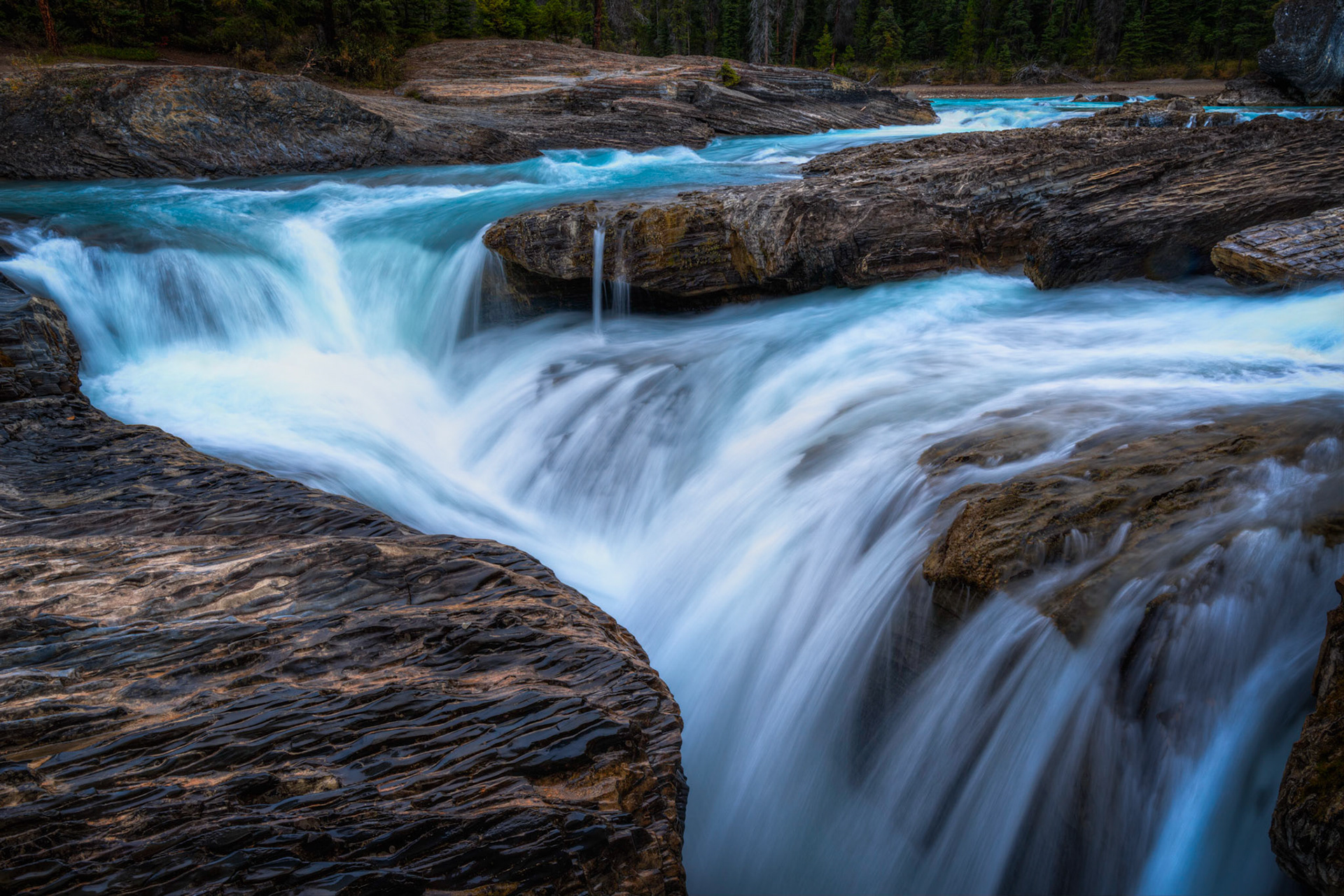Falls of the Kicking Horse River, at Natural Bridge.Yoho National ParkBritish Columbia, CanadaSeptember 22, 2016This is an HDR image consisting of 5 exposures merged in Photomatix Pro. Additional processing in Lightroom and Photoshop.PENTAX K-1, HD PENTAX-D FA 15-30mm F2.8ED SDM WRISO 100 21 mm  ⅛ sec at ƒ / 22