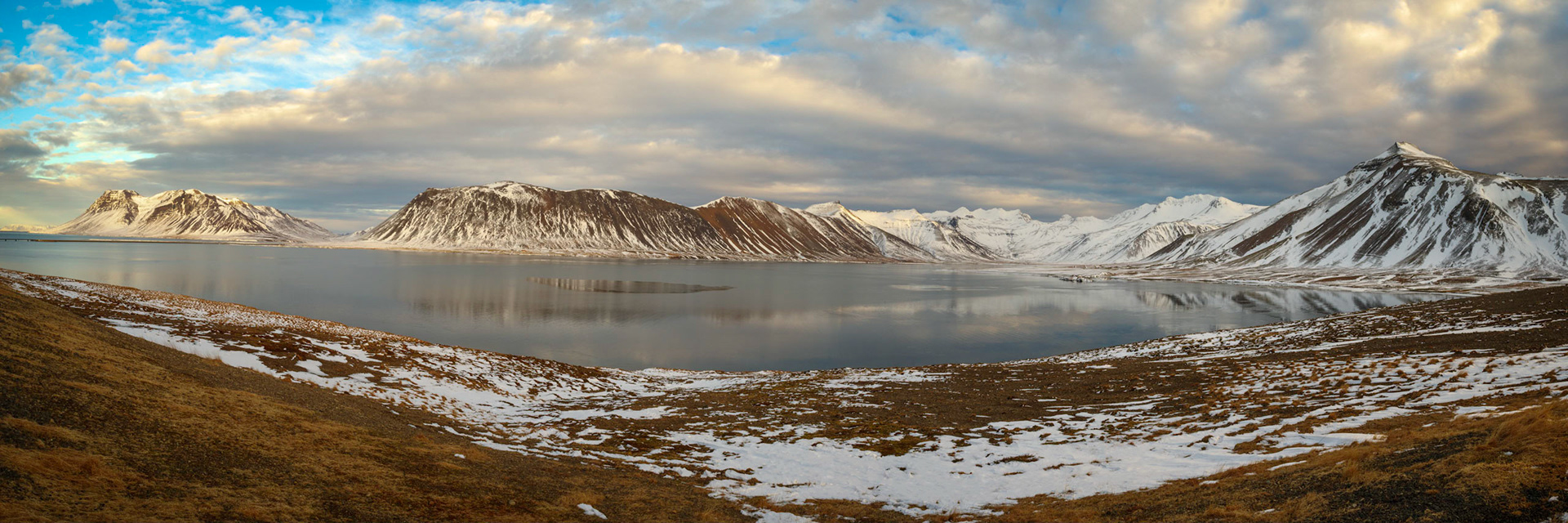 A panoramic view of Kolgrafafjörður, a little bit before sunset.Grundarfjörður, Vesturland, IcelandMarch 13, 2018This is a panoramic images consisting of 5 frames stitched in Photoshop. Additional processing in Lightroom and Photoshop.PENTAX K-1, HD PENTAX-D FA 24-70mm F2.8ED SDM WRISO 100 24 mm  ¹⁄₁₅ sec at ƒ / 16