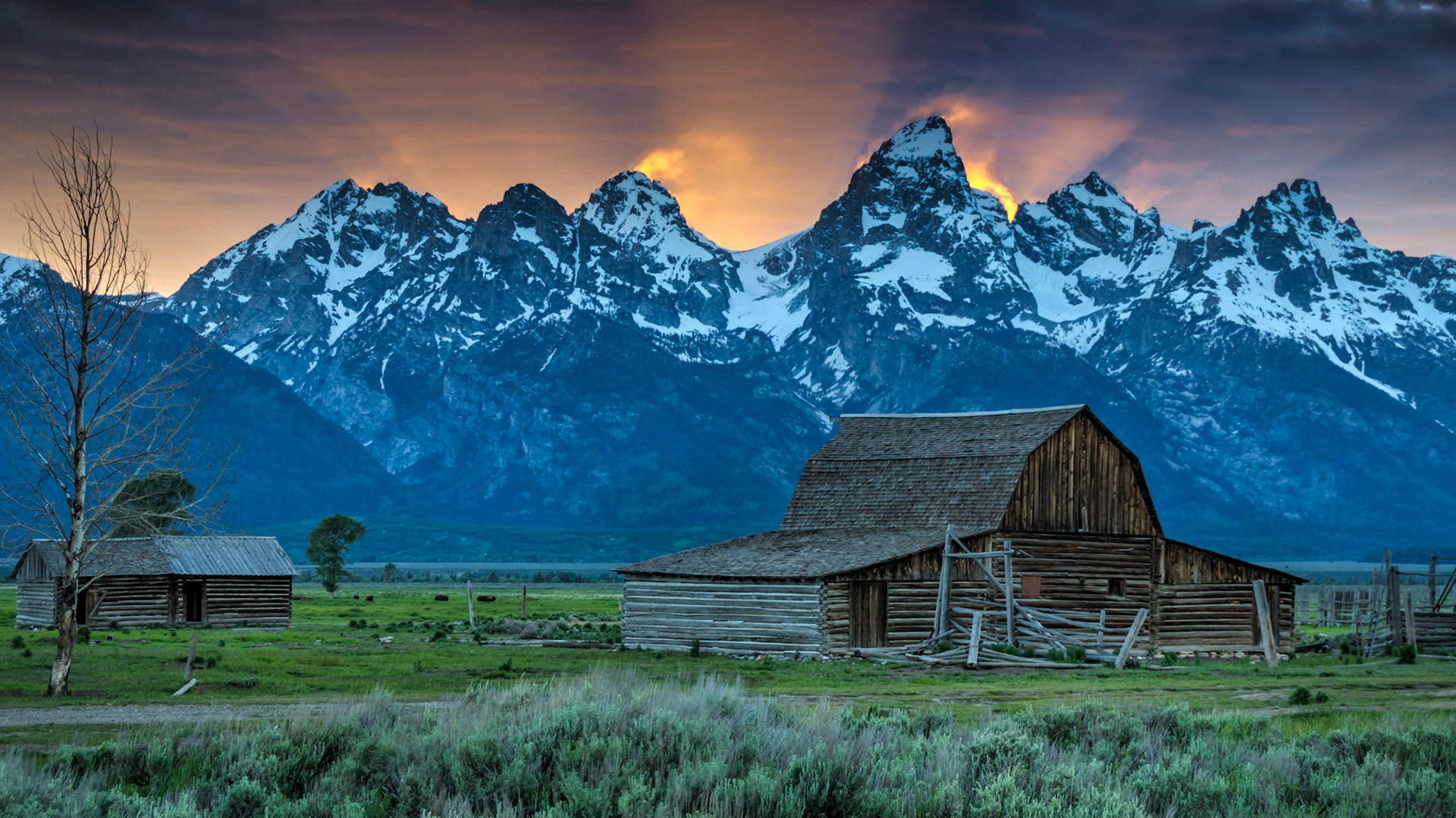 Sunset at the John Moulton Barn on Mormon Row. Grand Teton National Park19 June 2014PENTAX K-3, Sigma 18-250mm f/3.5-6.3 DC OS HSMISO 100 37 mm  ¹⁄₁₃ sec at ƒ / 8.0Prints of my work are available from my website at http://www.fingolfinphoto.comFollow me on Facebook at http://www.facebook.com/fingolfinphoto or http://www.facebook.com/pesterleAlso, http://500px.com/pesterle   http://www.flickr.com/photos/fingolfinphoto
