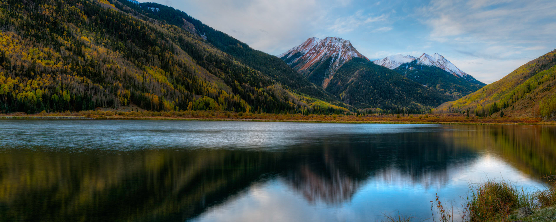 Sunrise at Crystal Lake, near Ouray, Colorado.Uncompahgre National ForestColoradoSeptember 27, 2017This is an HDR panoramic image consisting of 7 frames comprised of 2 exposures each. HDR processing performed in Photomatix Pro.  Panoramic stitching performed in Photoshop. Additional processing performed in Lightroom and Photoshop.PENTAX K-1, TAMRON 28-300mm F3.5-6.3 Ultra zoom XRISO 100 63 mm  4.0 sec at ƒ / 16