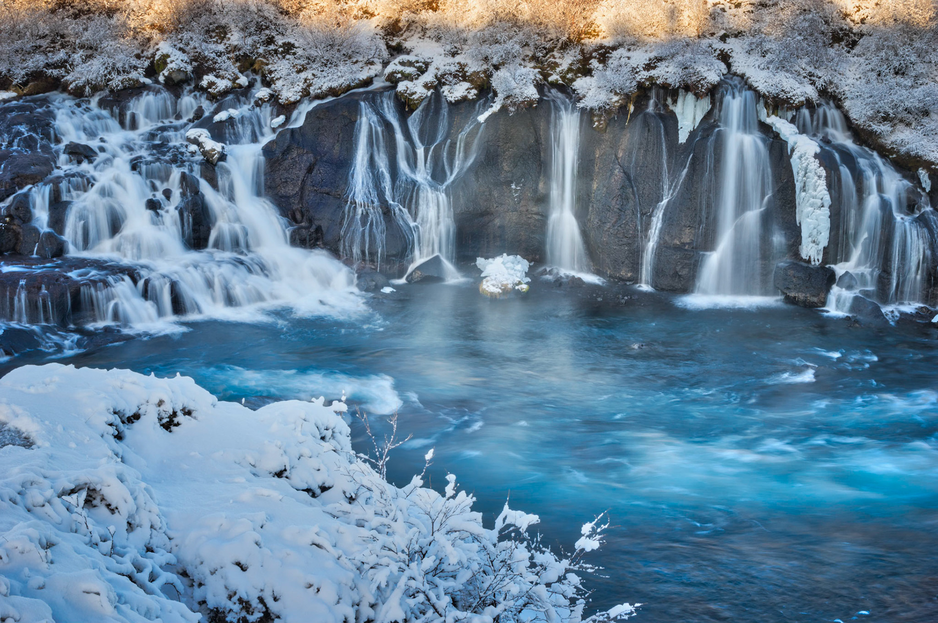 Hraunfossar, where springs of water emerge from under the edge of the Hallmundarhraun lava field, and flow into the Hvítá River.Vesturland, IcelandFebruary 5, 2016This is an HDR image consisting of 5 exposures merged in Photomatix Pro. Additional processing in Lightroom and Photoshop.PENTAX K-3, Sigma 18-250mm f/3.5-6.3 DC OS HSMISO 100 37 mm  ¼ sec at ƒ / 16