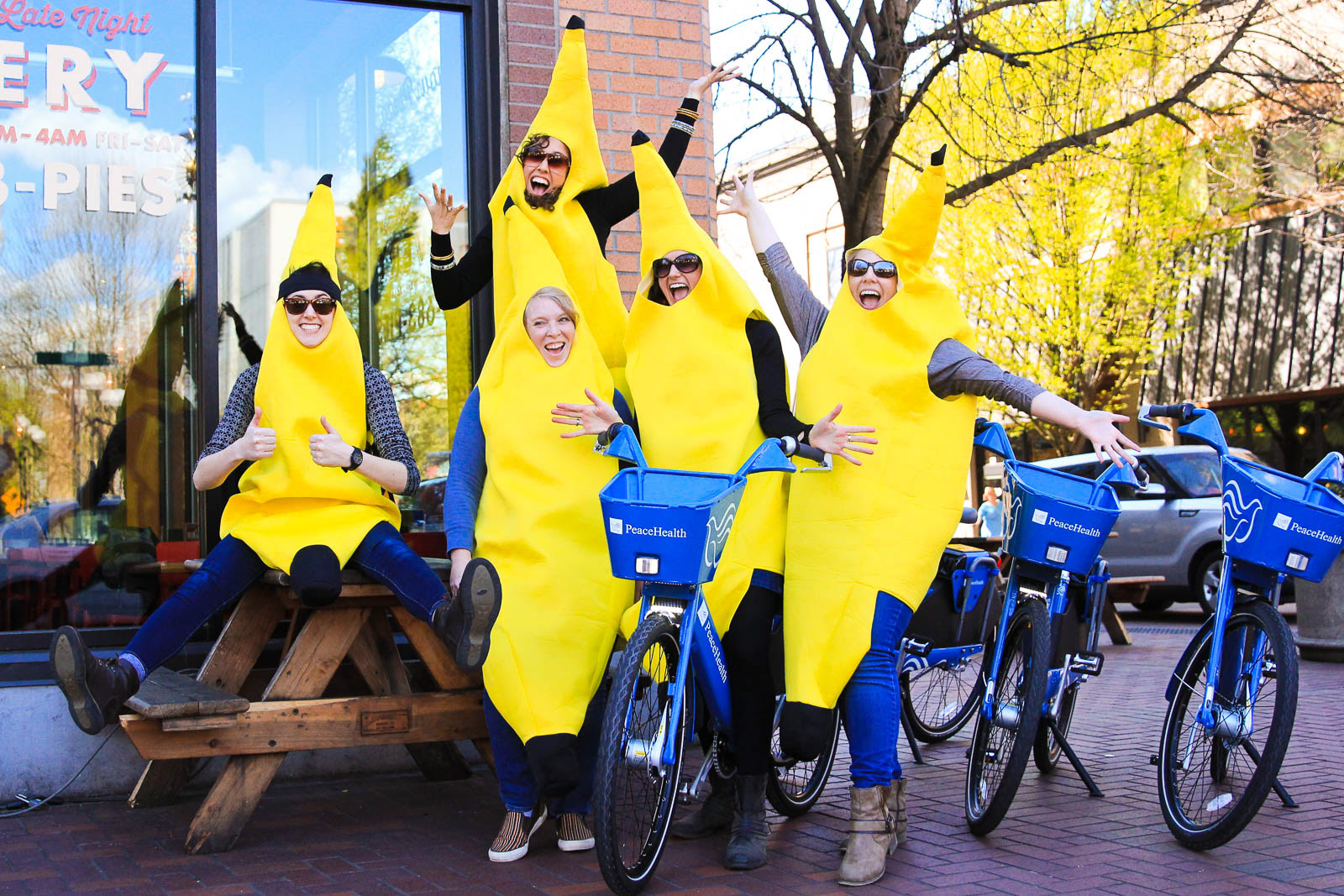 City of Eugene team riding Peacehealth bicycles in banana suits