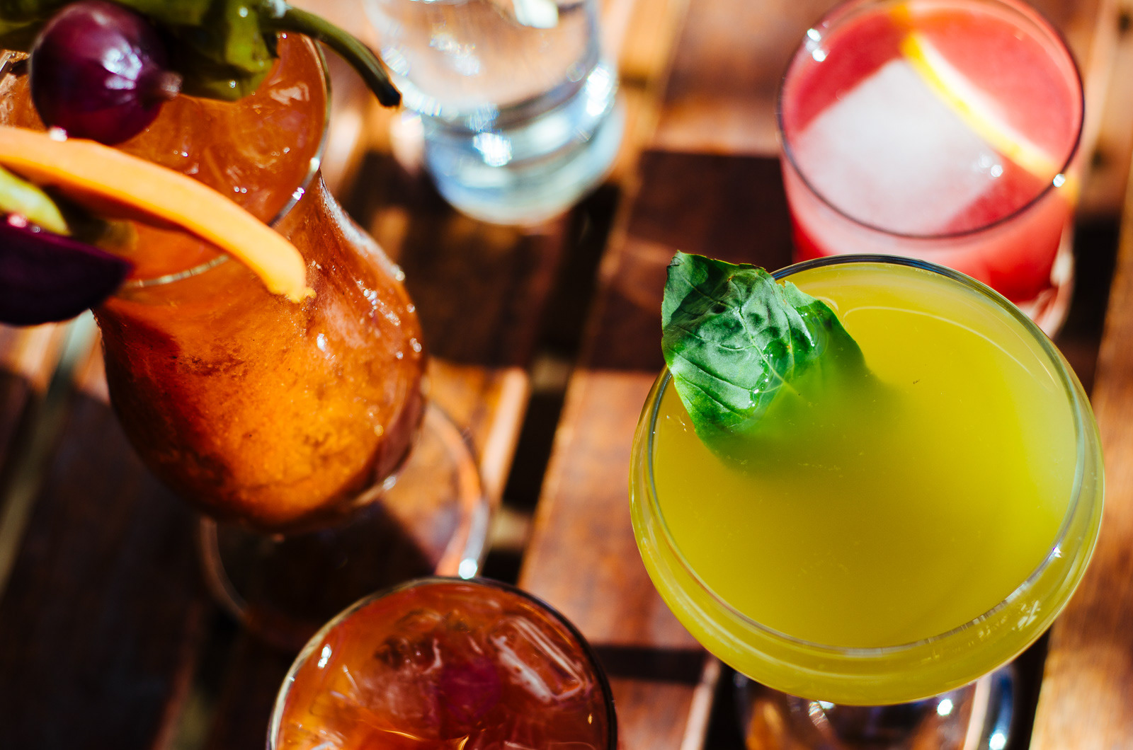 Close-up photograph of several cocktail drinks for local restaurant and bar