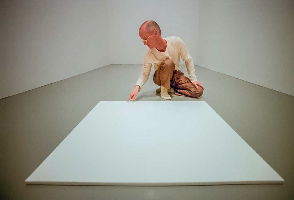 Installation artist Wolfgang Laib with his milk sculpture at the Hirshhorn Gallery, October 26, 2000