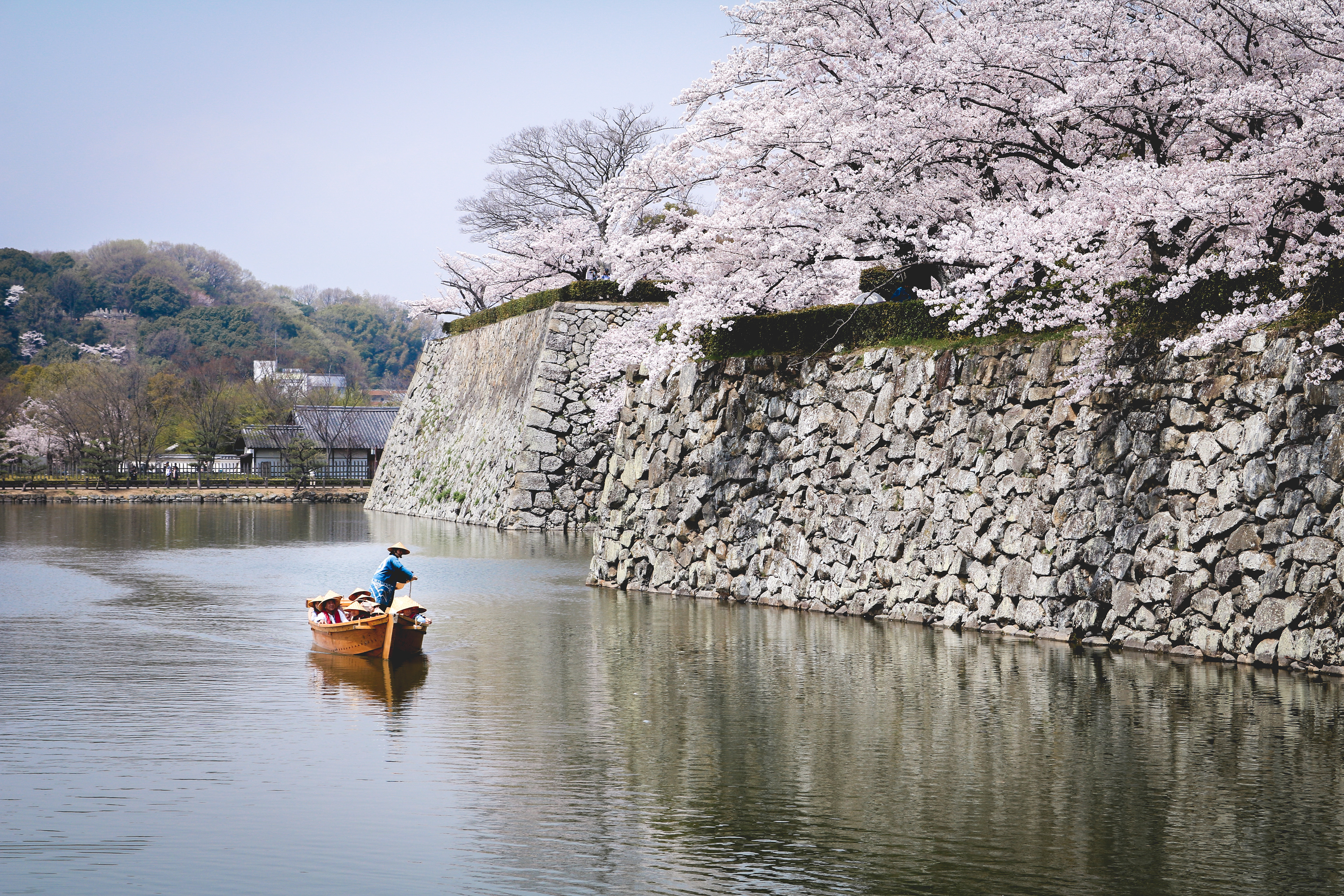 Tourists enjoying the moat of Himeji Castle, Japan, 2018