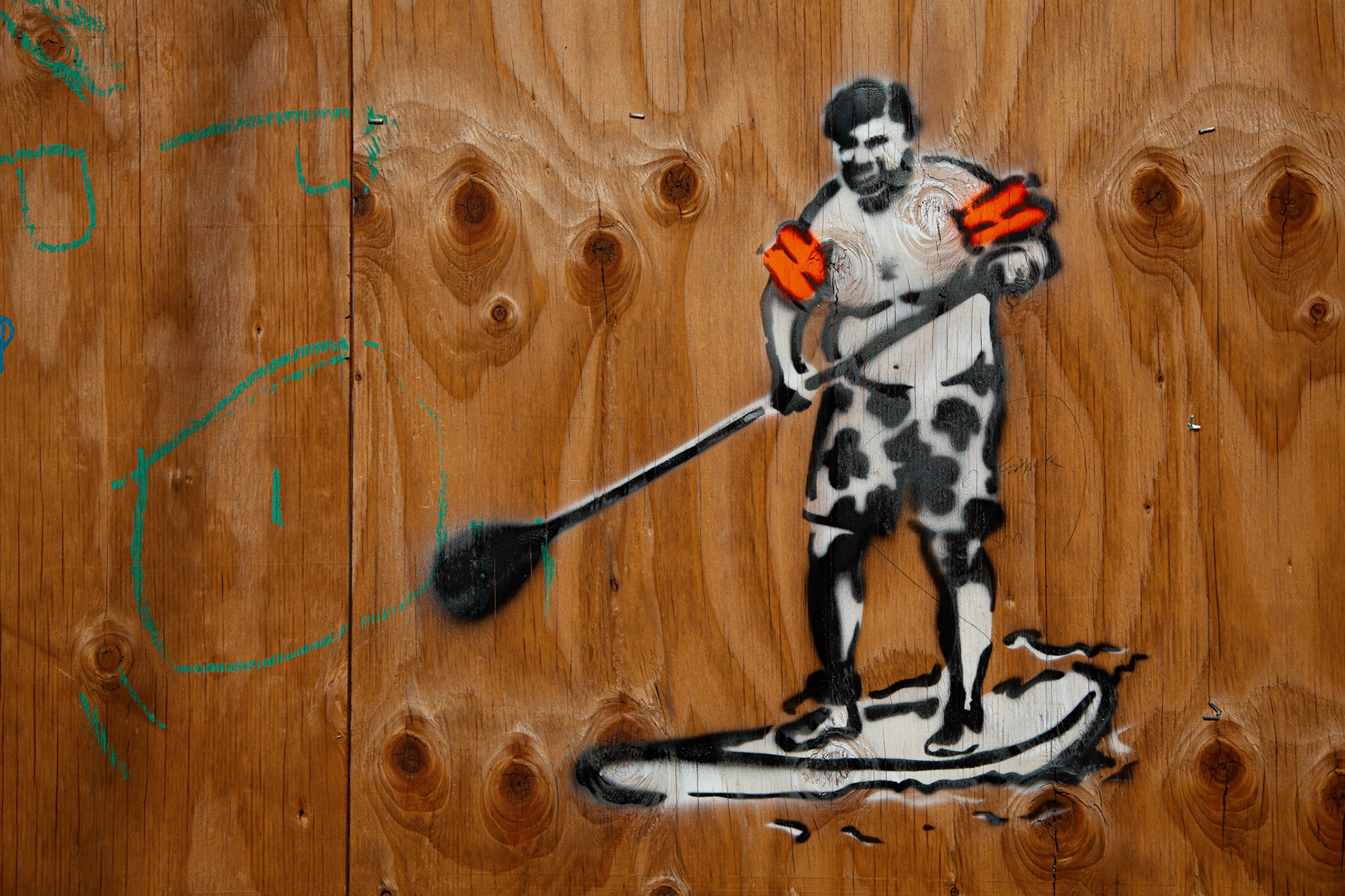 Awesome stencil graffiti on the main strip in Pa'ia, Maui.