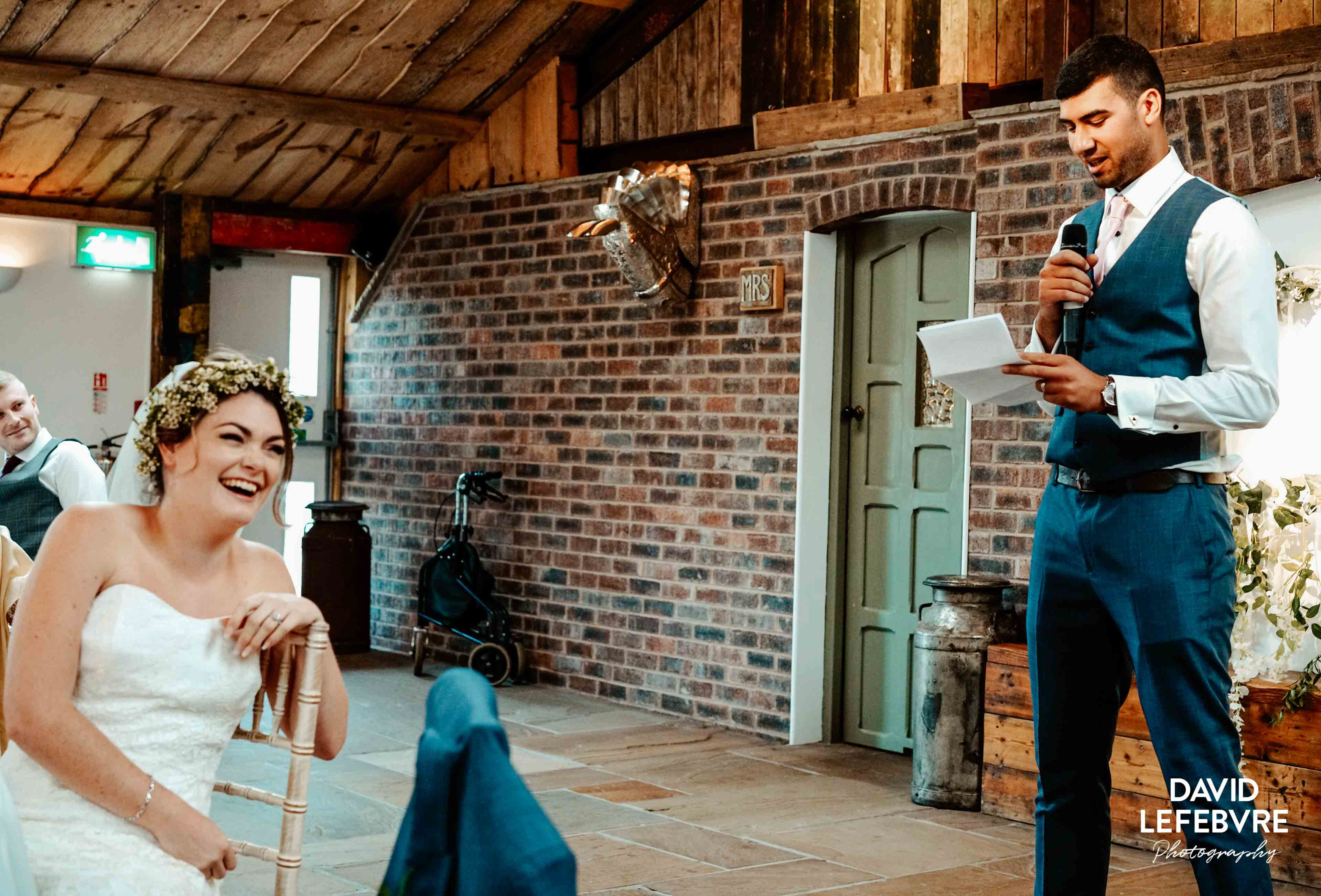 groom giving his funny speech to his wife at owen barn house