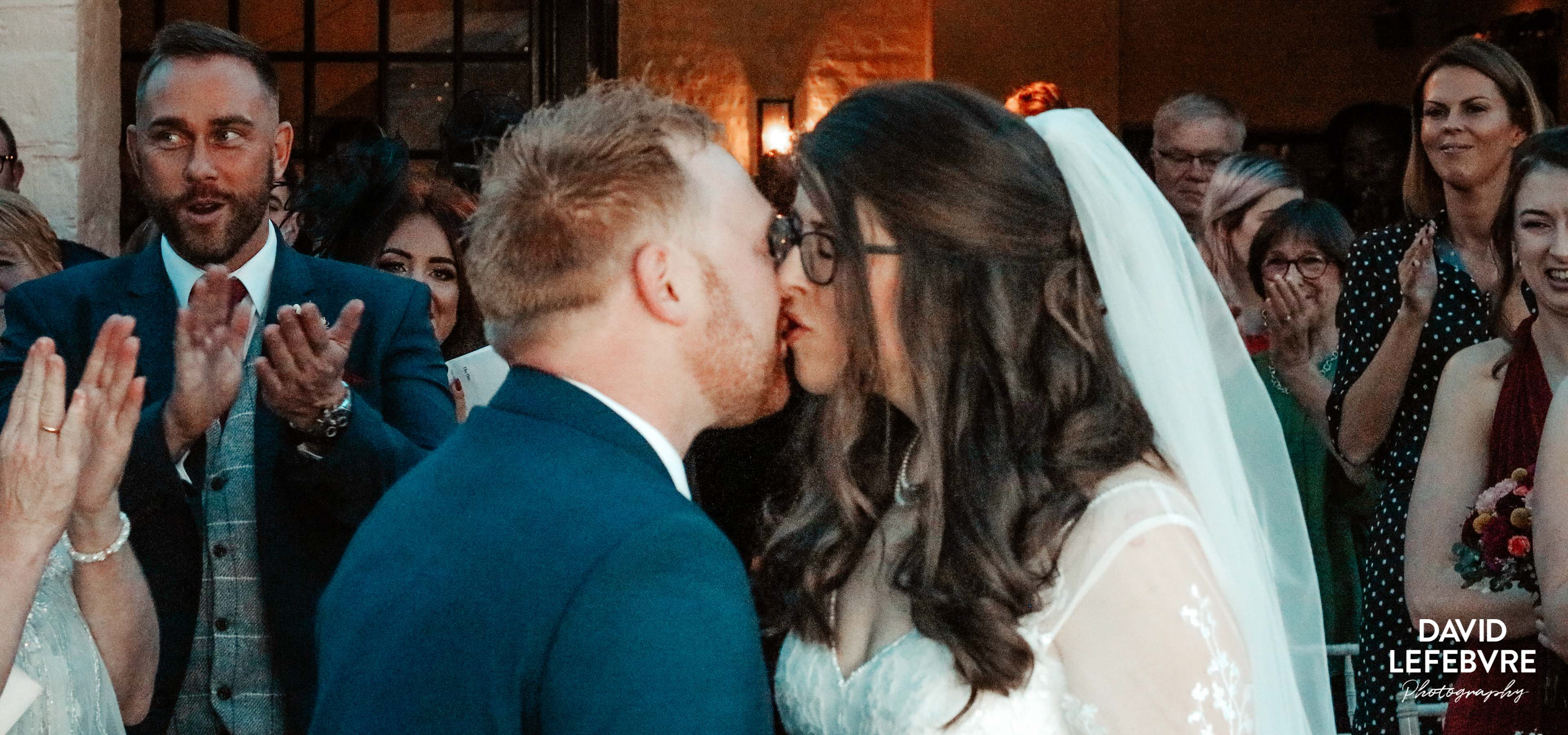 bride and groom kiss at wedding at bay tree