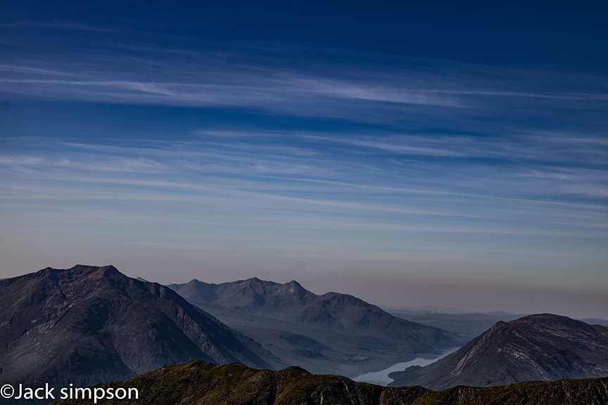 This photogragh was taken from just below the summit of Bidean nam Bian in Glencoe. You can clearly see Loch Etive in the centre of the image with Ben Trilleachan and the “Etive Slabs” on the right hand side. The mountain on the left reflected in the loch is Stob Coir' an Albannaich.