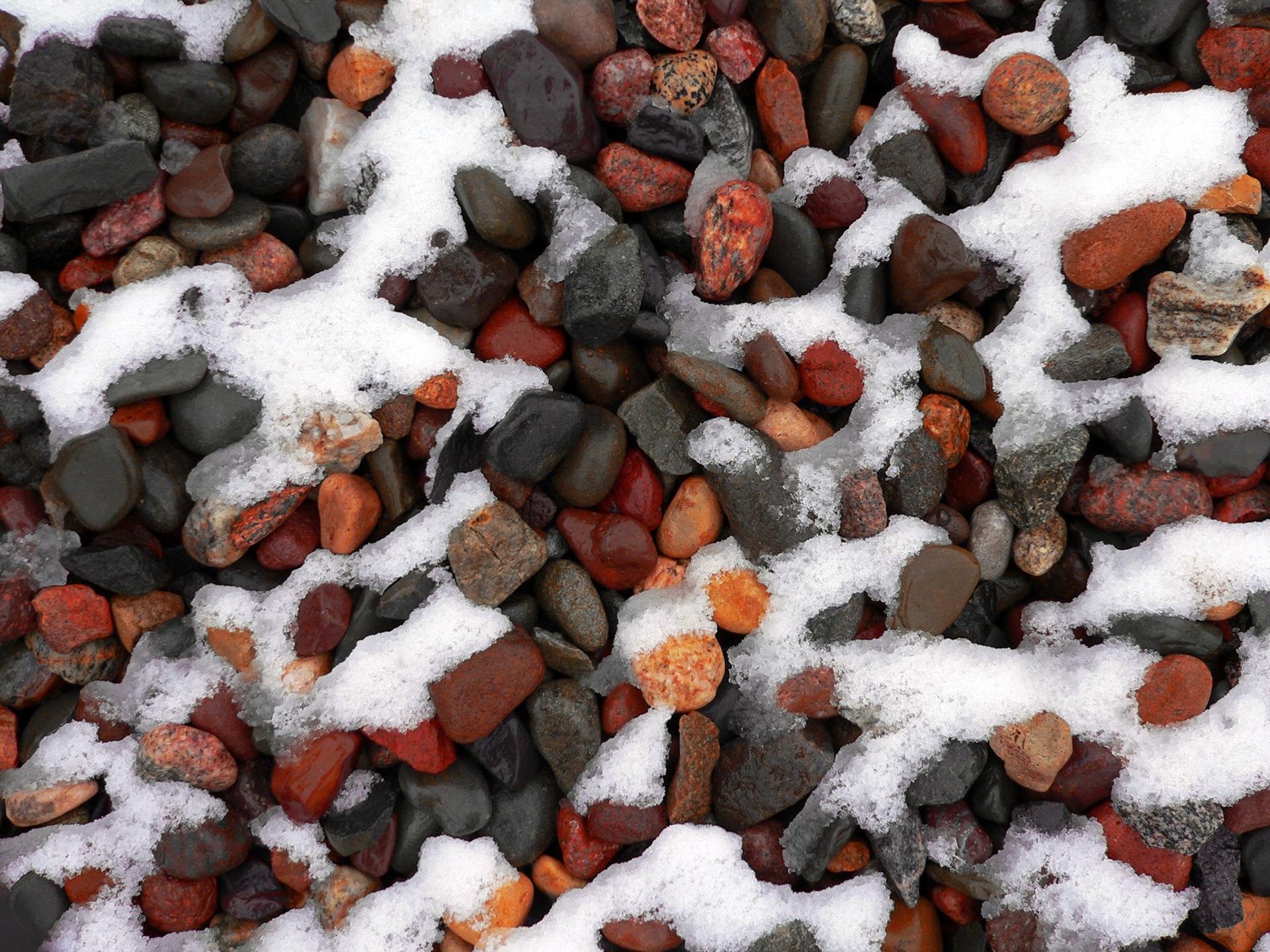 Gravel dusted with snow in Minneapolis Minnesota.