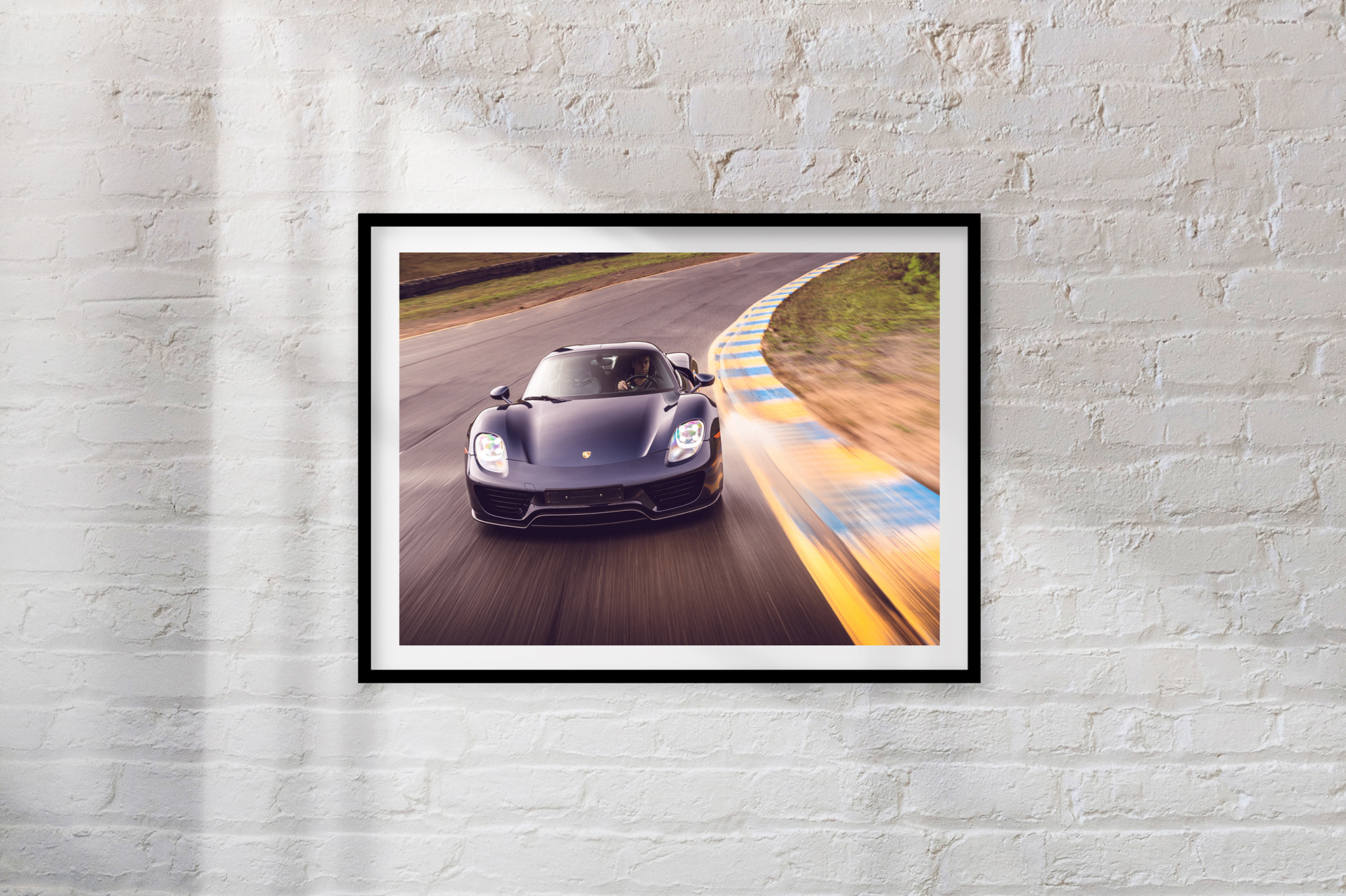 APEX: The Porsche in pursuit mode at Sonoma Raceway, California.