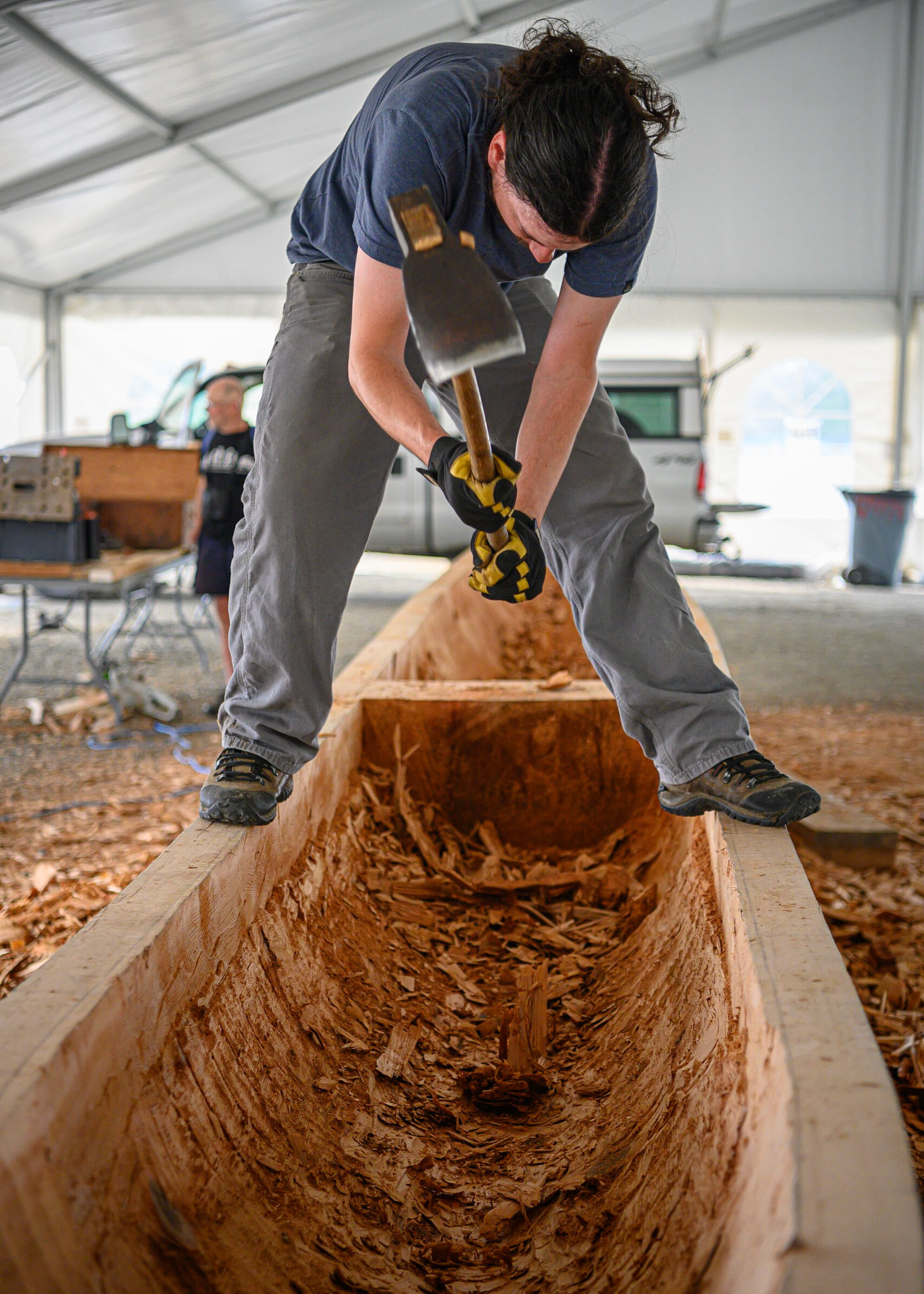 Tlingit canoe being carved out. Carcross, Yukon