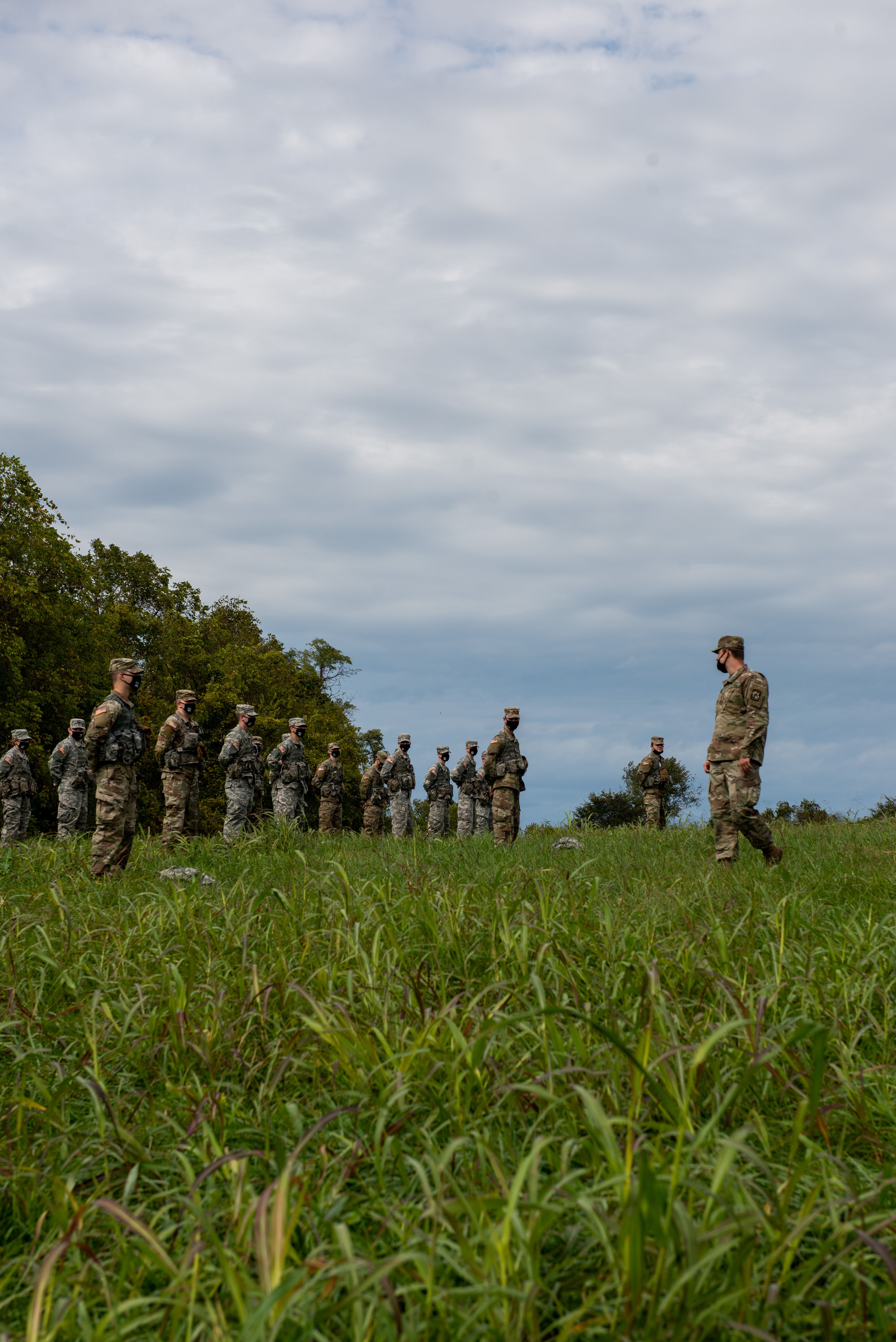 The underclassmen ROTC cadets stand at attention for their commanding officer at the start of their weekly lab near the Ridges in Athens, Ohio on Sept. 30, 2020.