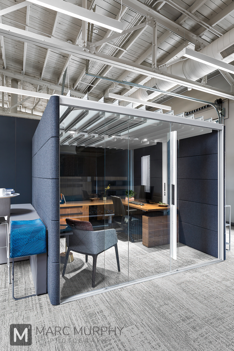 Workspace Interiors Private Orangebox Office with desk, chairs and open louvered ceiling