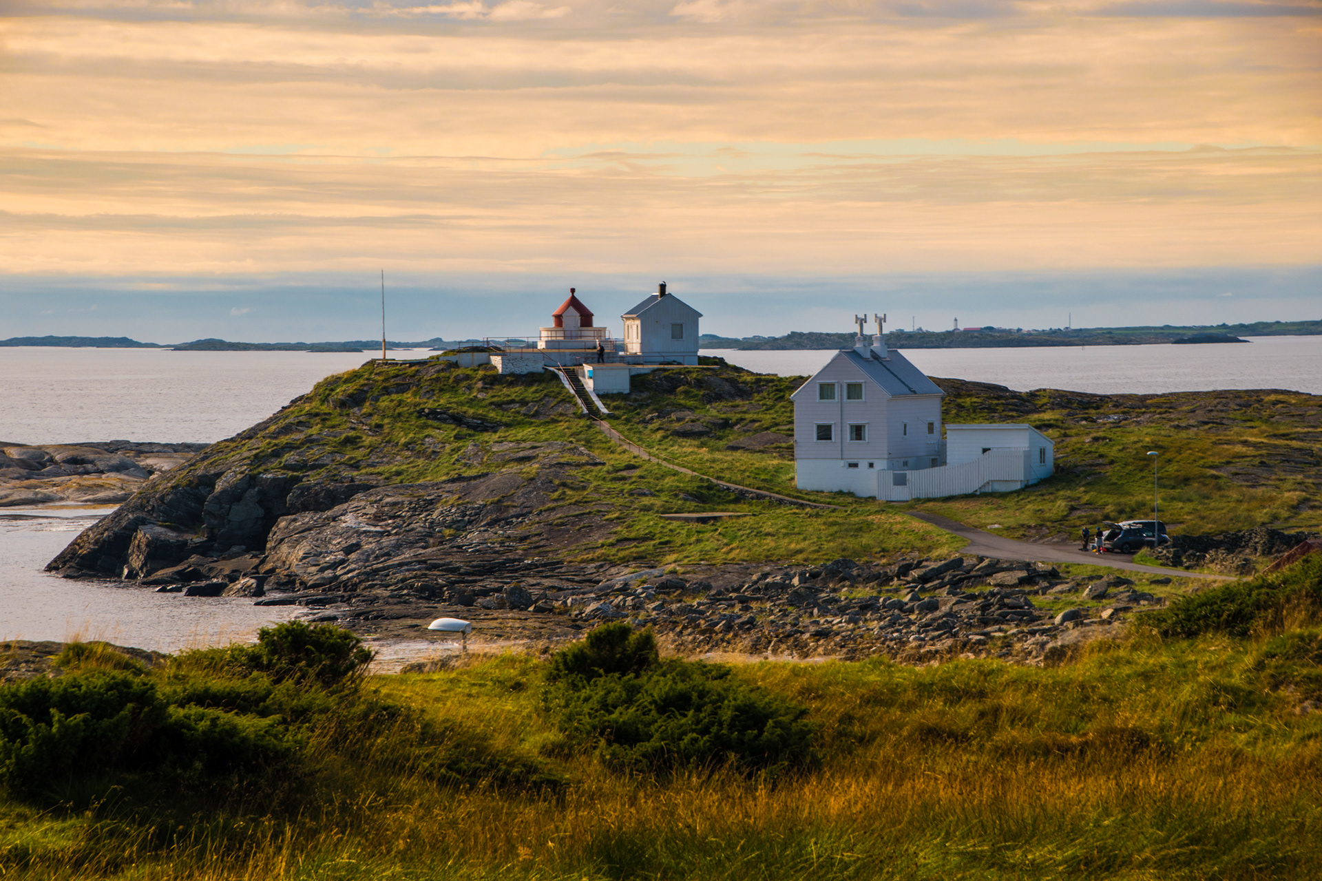 One of Norway's many lighthouses, here in Fjøløy, region Stavanger - the landscape was tinted orange by one of the epic sunsets here.