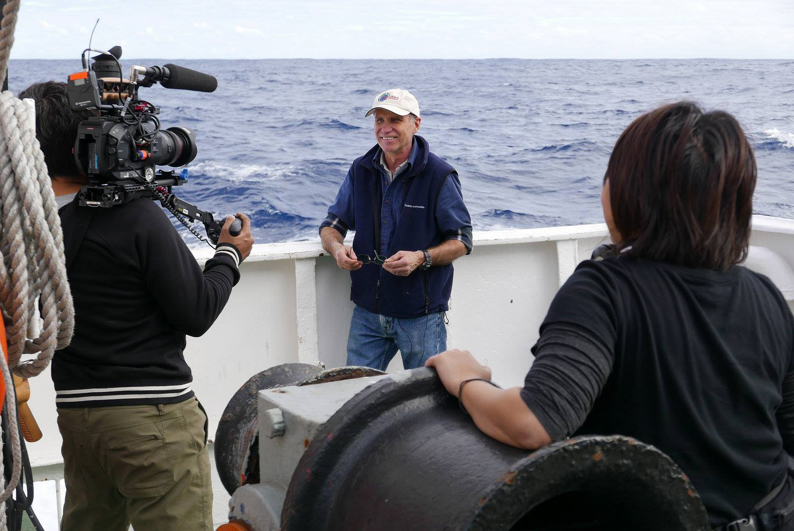 Dan and Lizette grab portrait shots of Oceanographer Scott Glenn.