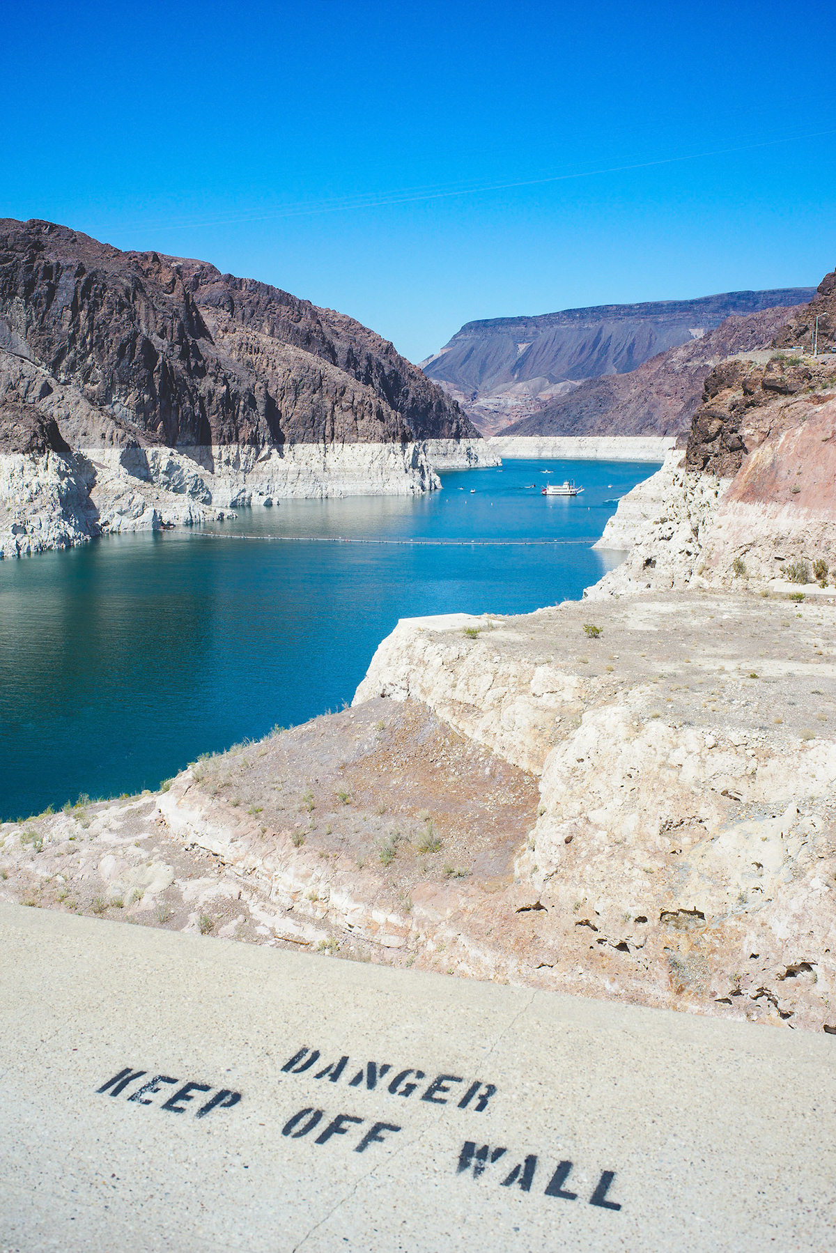 Danger - Keep of Wall note on a Hoover Dam handrail