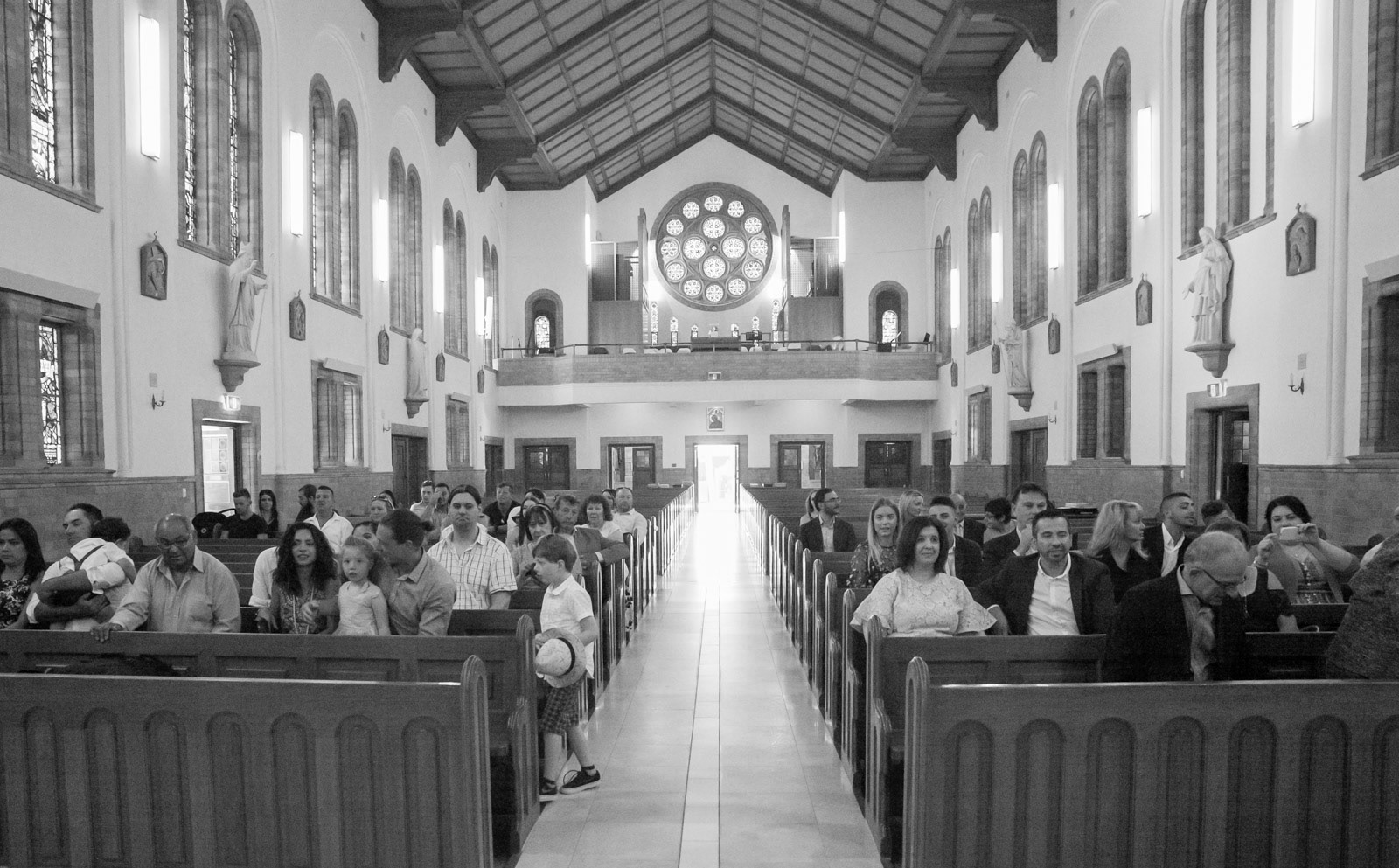 Christening photography at Saint Christopher's Roman Catholic Cathedral in Canberra.
