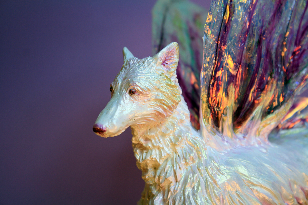 fairy with wolf figurine