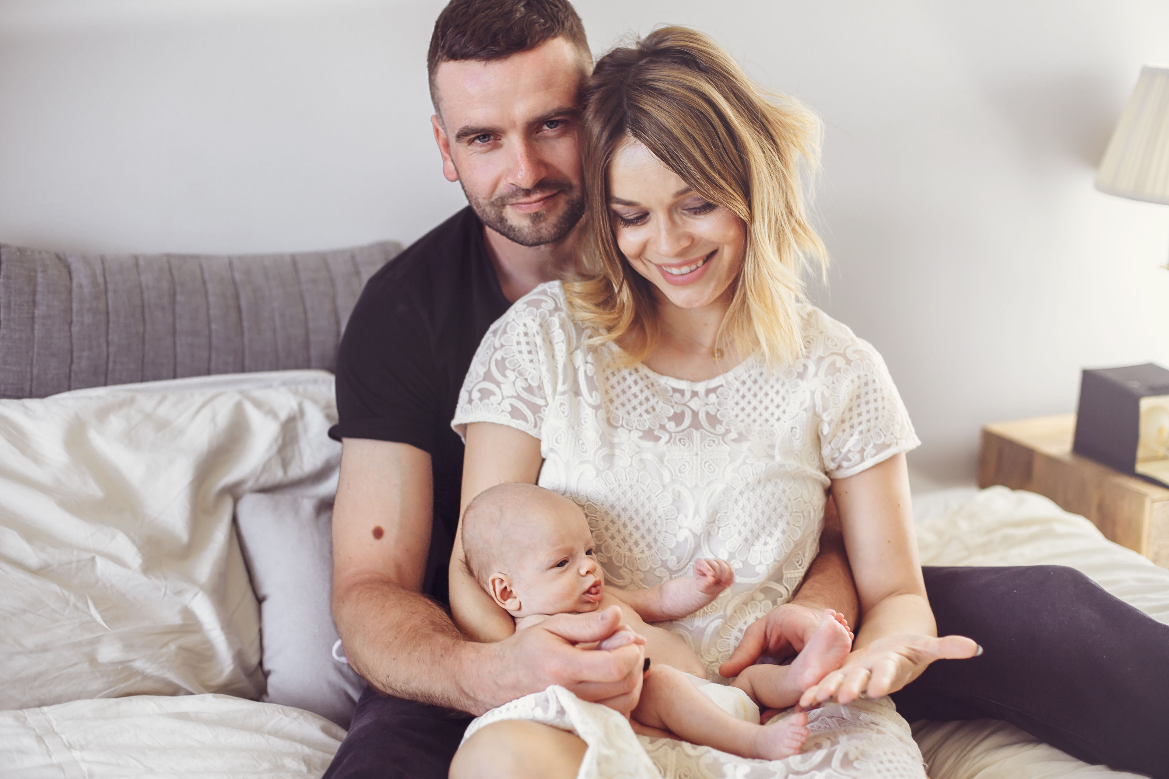 family portrait with newborn at home