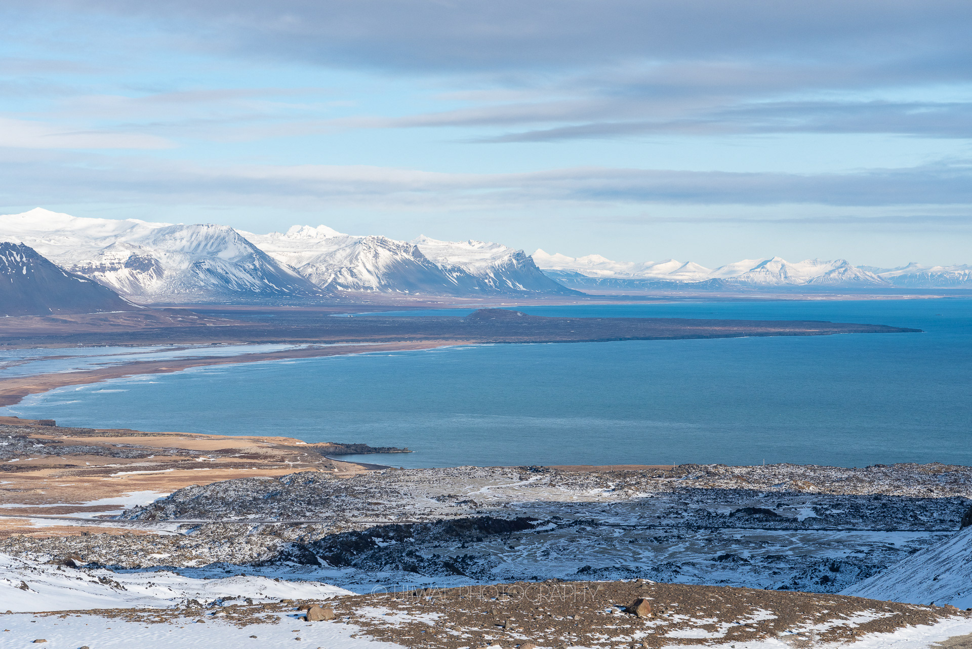 Snowcapped mountains along the hwy
