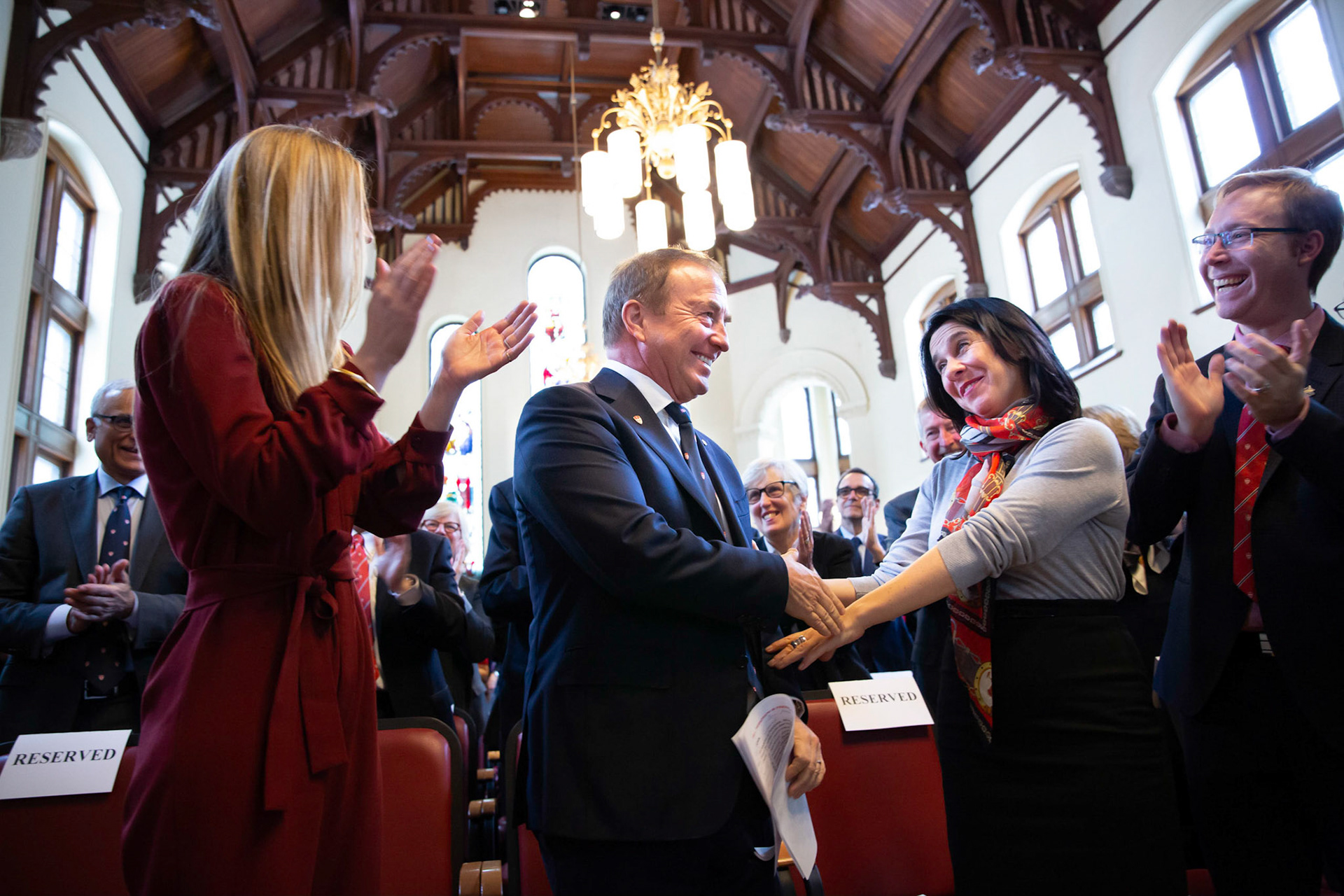  John McCall MacBain clasps hands with Montreal Mayor Valérie Plante at the announcement of his and  Marcy McCall Macbain’s $200-million gift to McGill. February 2019.