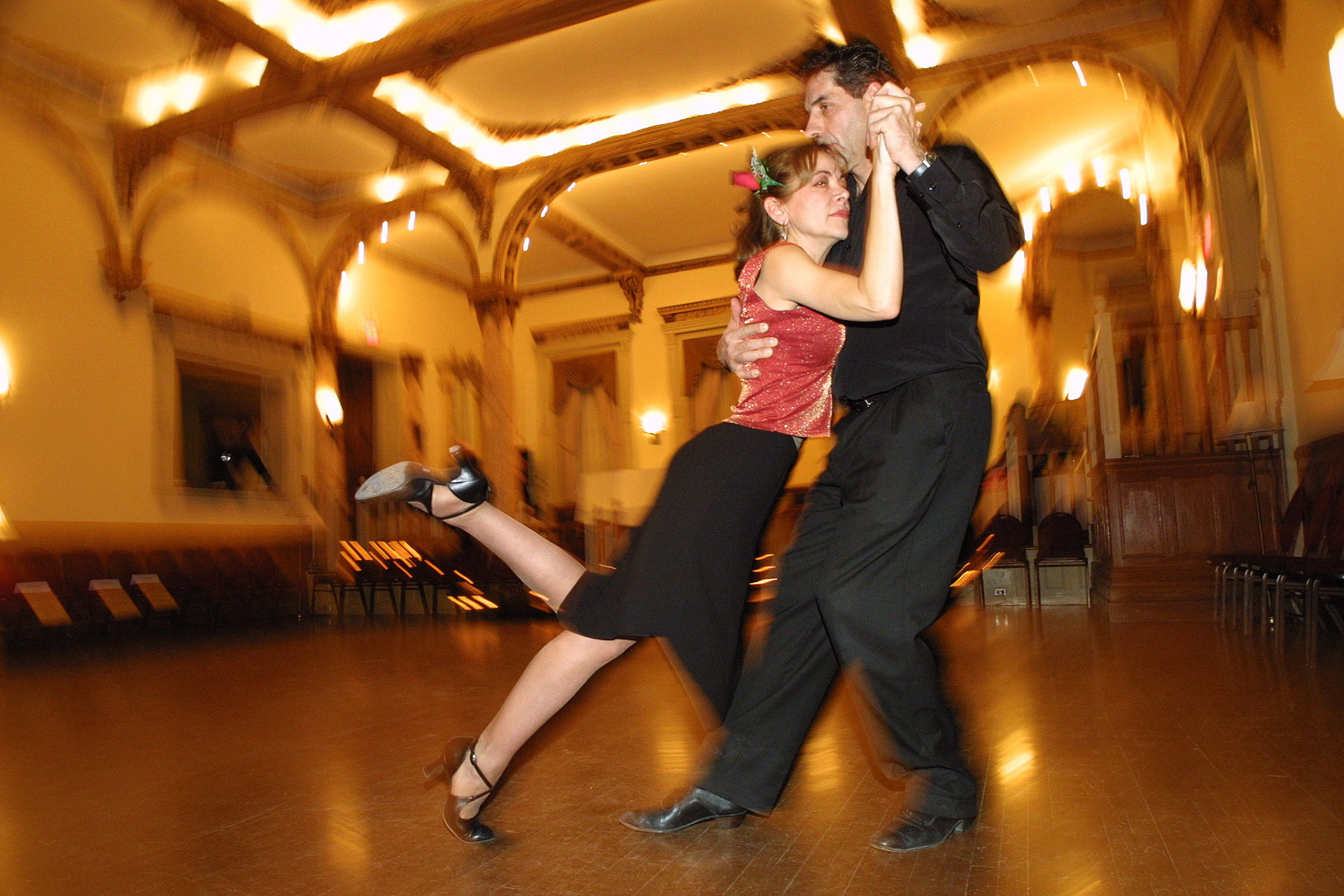 Tango Passion!  ... was the name of the 2002 Centraide fundraiser. One of its organizers, Lydia Martone is seen here kicking up one heel.  