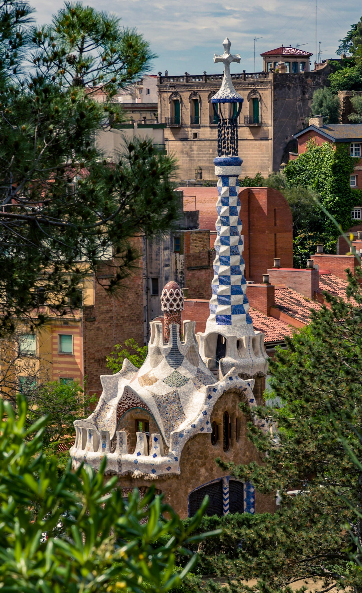 The magical Gaudi design with "ordinary Barcelona behind