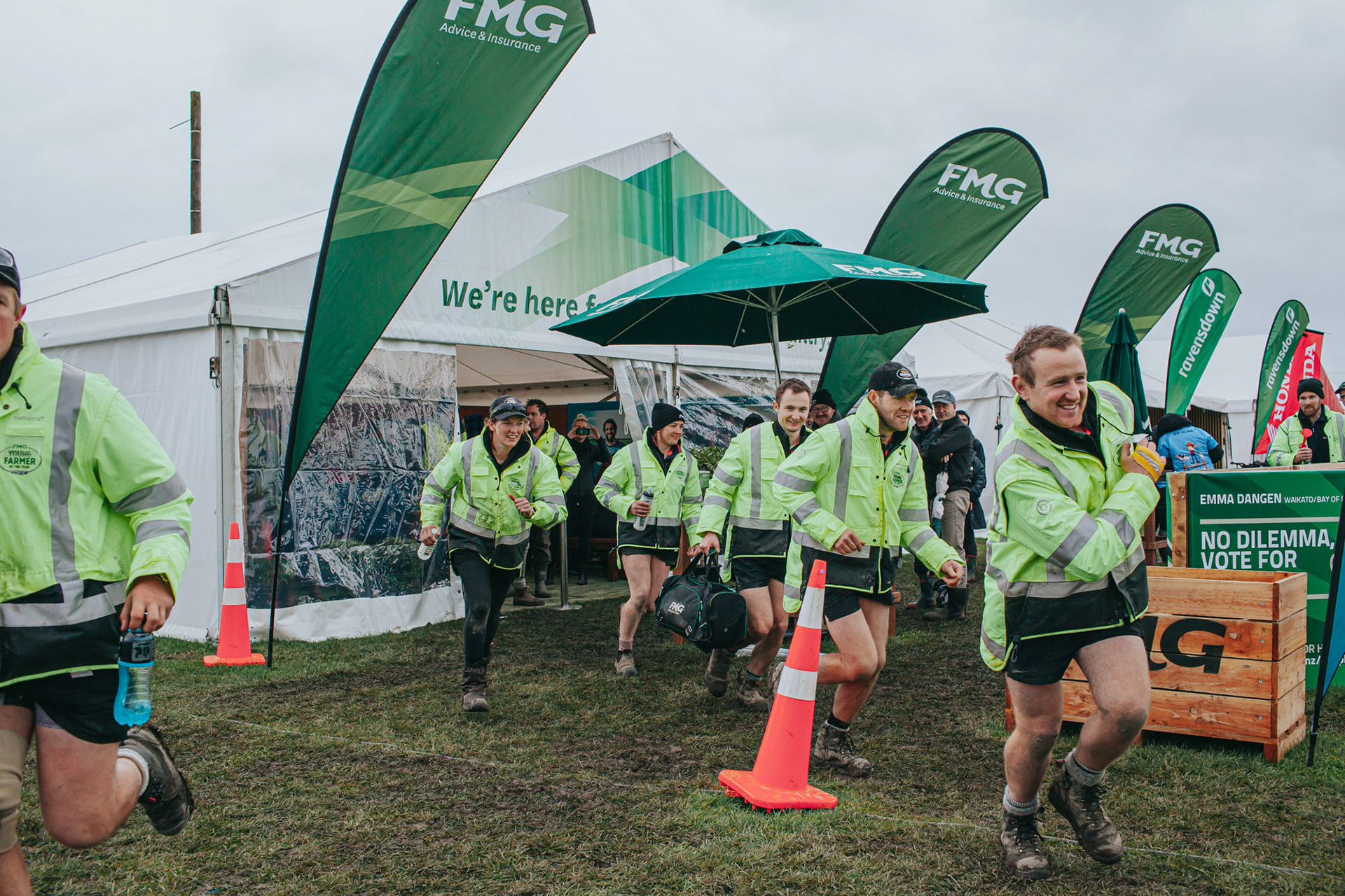 The FMG Young Farmers of the Year competitors run out from the starting tent on the Practical Day of the competition.