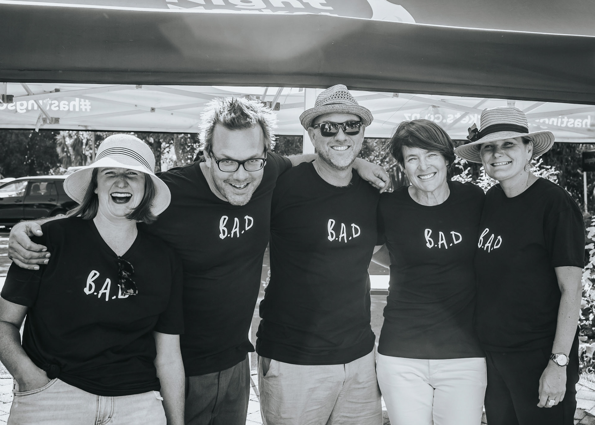 The B.A.D. team smiling for the camera at the Beer Appreciation Day event