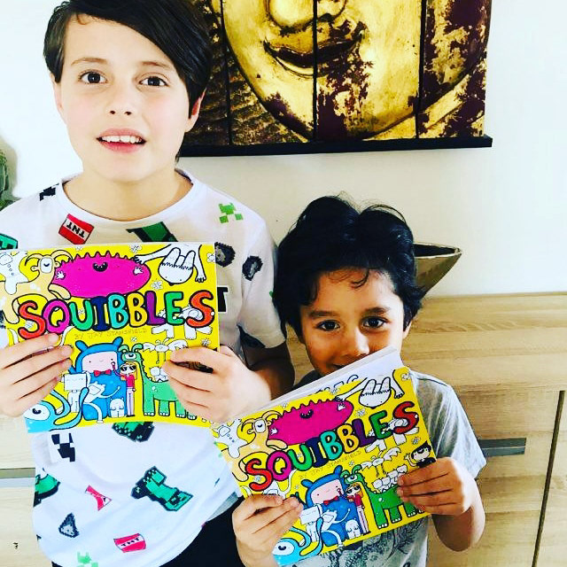 Squibblers with a copy of Squibbles