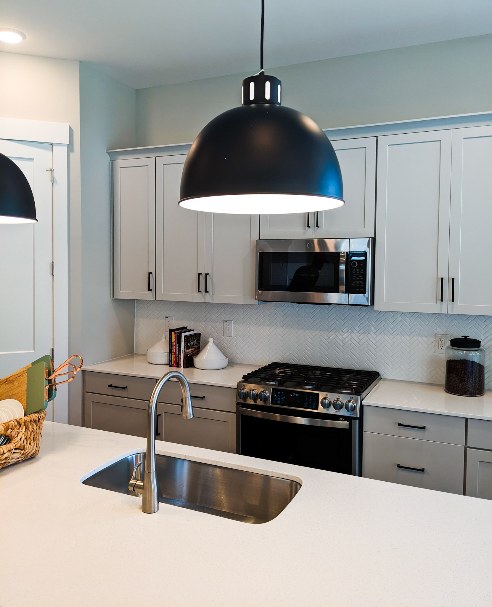 Personal Selections: Cabinets, counters, hardware, plumbing, flooring, tile, backsplash, appliances, and lighting. Other selections made by Model Home Interiors.