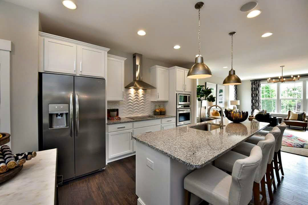 Personal Selections: Tile, flooring, and lighting. Other selections made by Model Home Interiors. Photo Credit: Stanley Martin Homes.