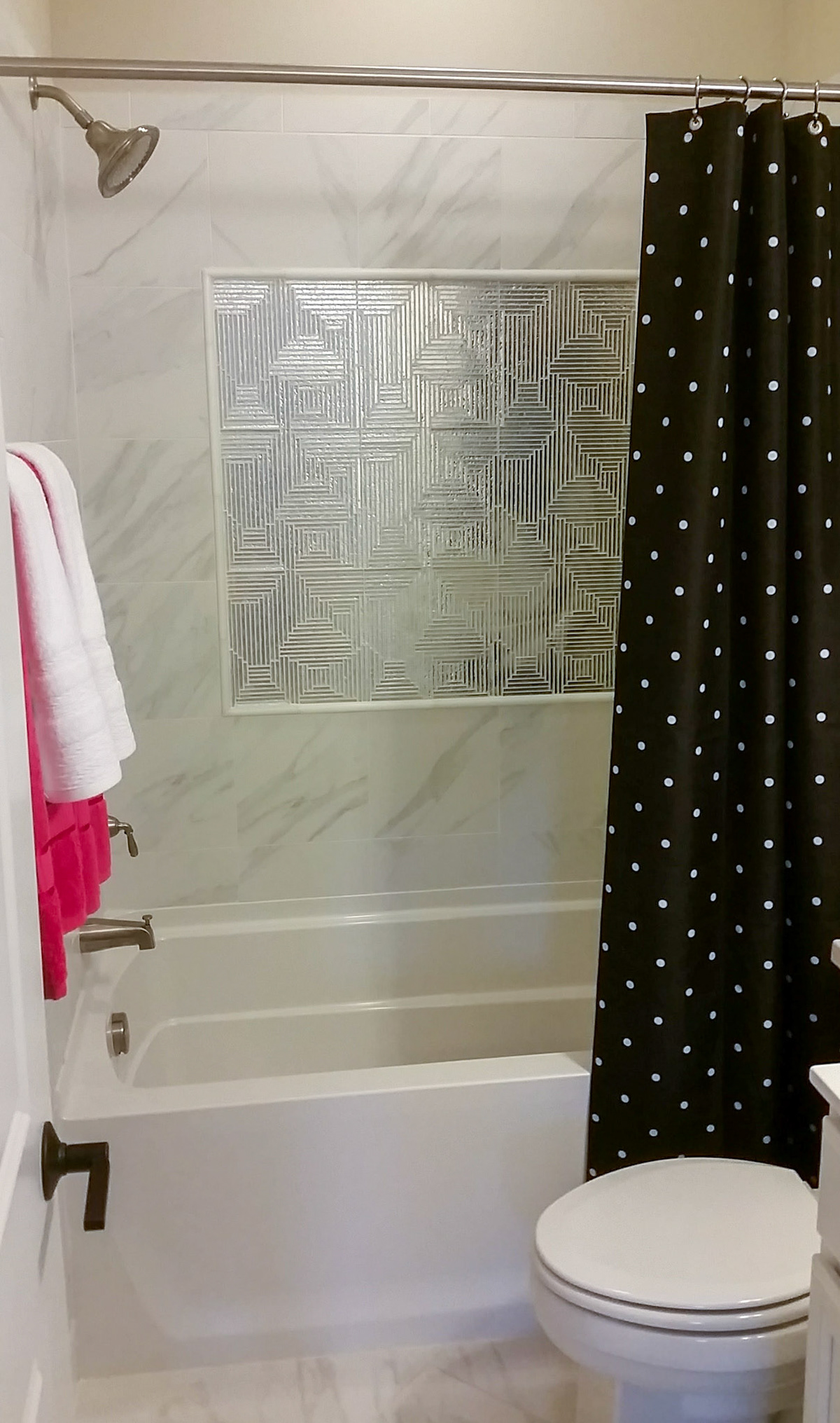 Personal Selections: Tile & lighting. Other selections made by Model Home Interiors.