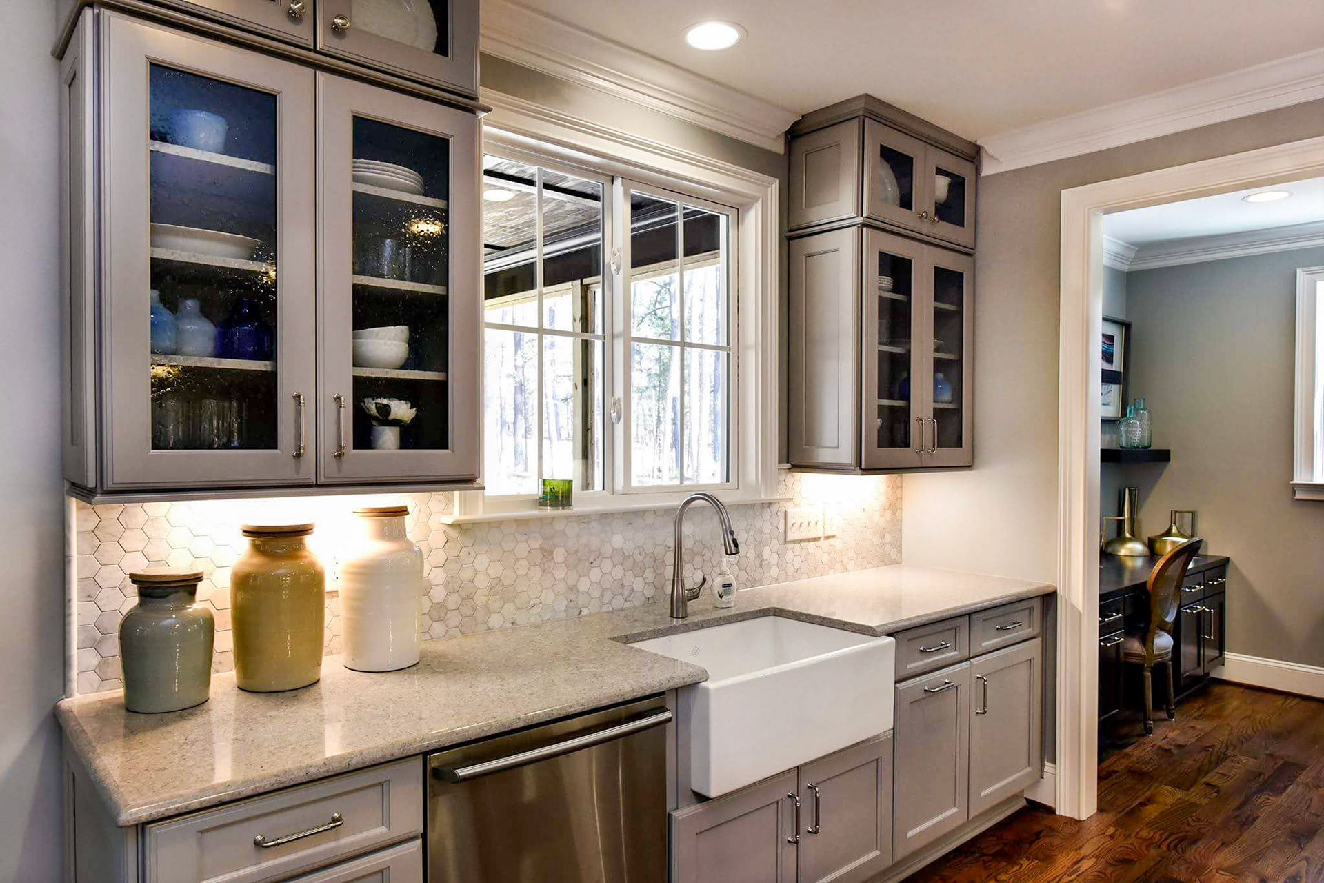 Personal Selections: Tile, flooring, and lighting. Other selections made by Merchandising Concepts. Photo Credit: Stanley Martin Homes.