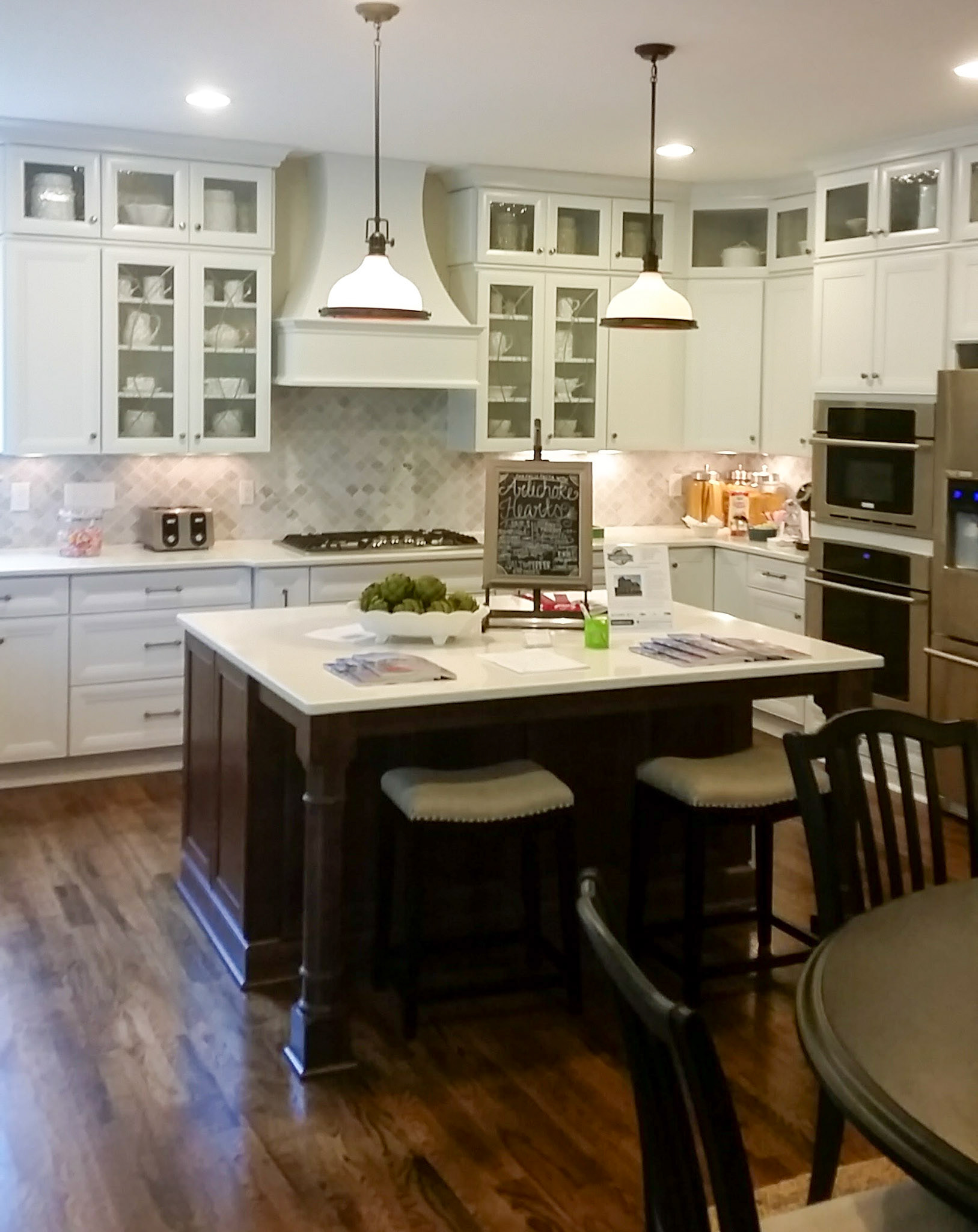 Personal Selections: Tile, flooring, and lighting. Other selections made by Model Home Interiors.