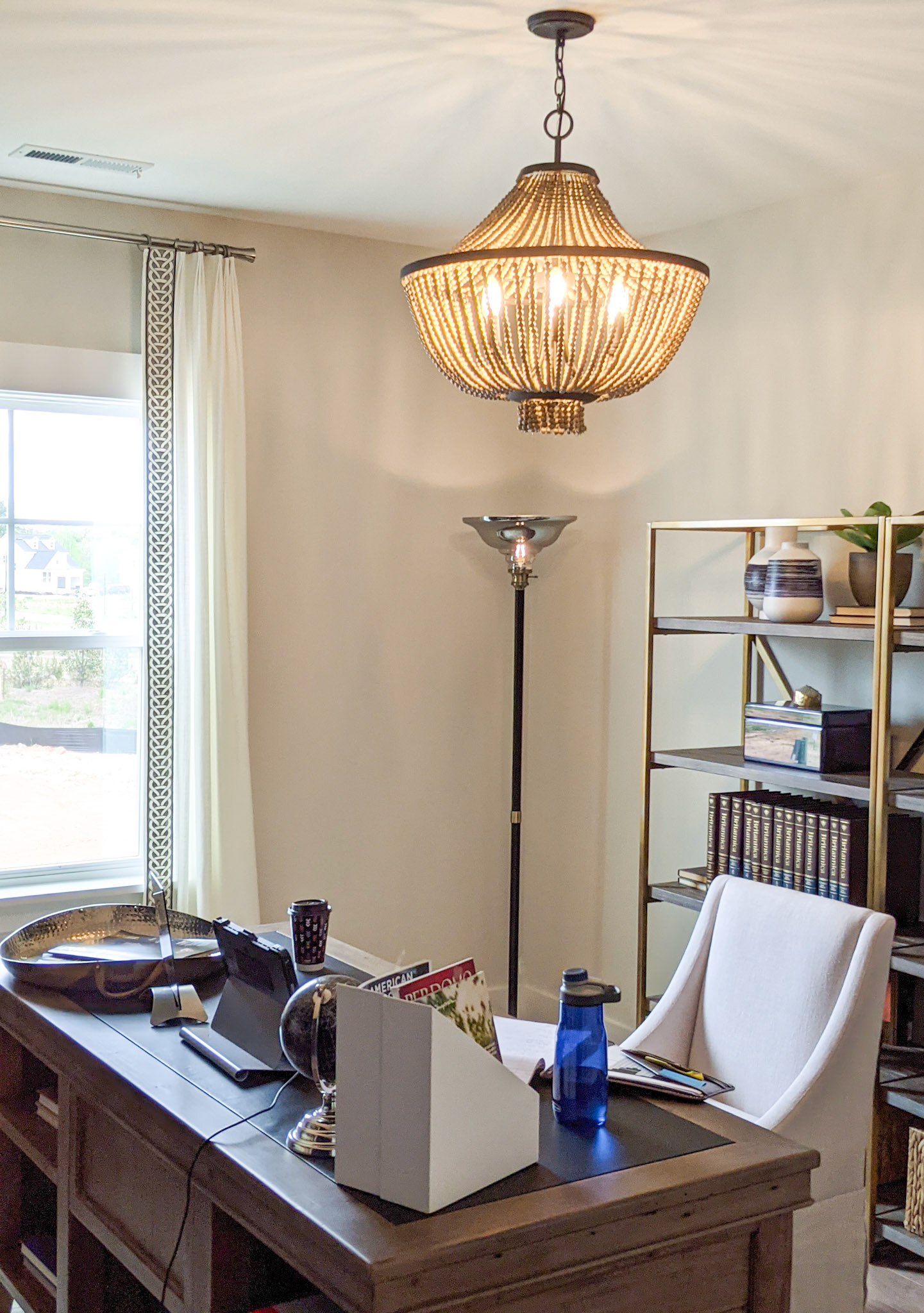 Personal Selections: Flooring & lighting. Other selections made by Model Home Interiors.