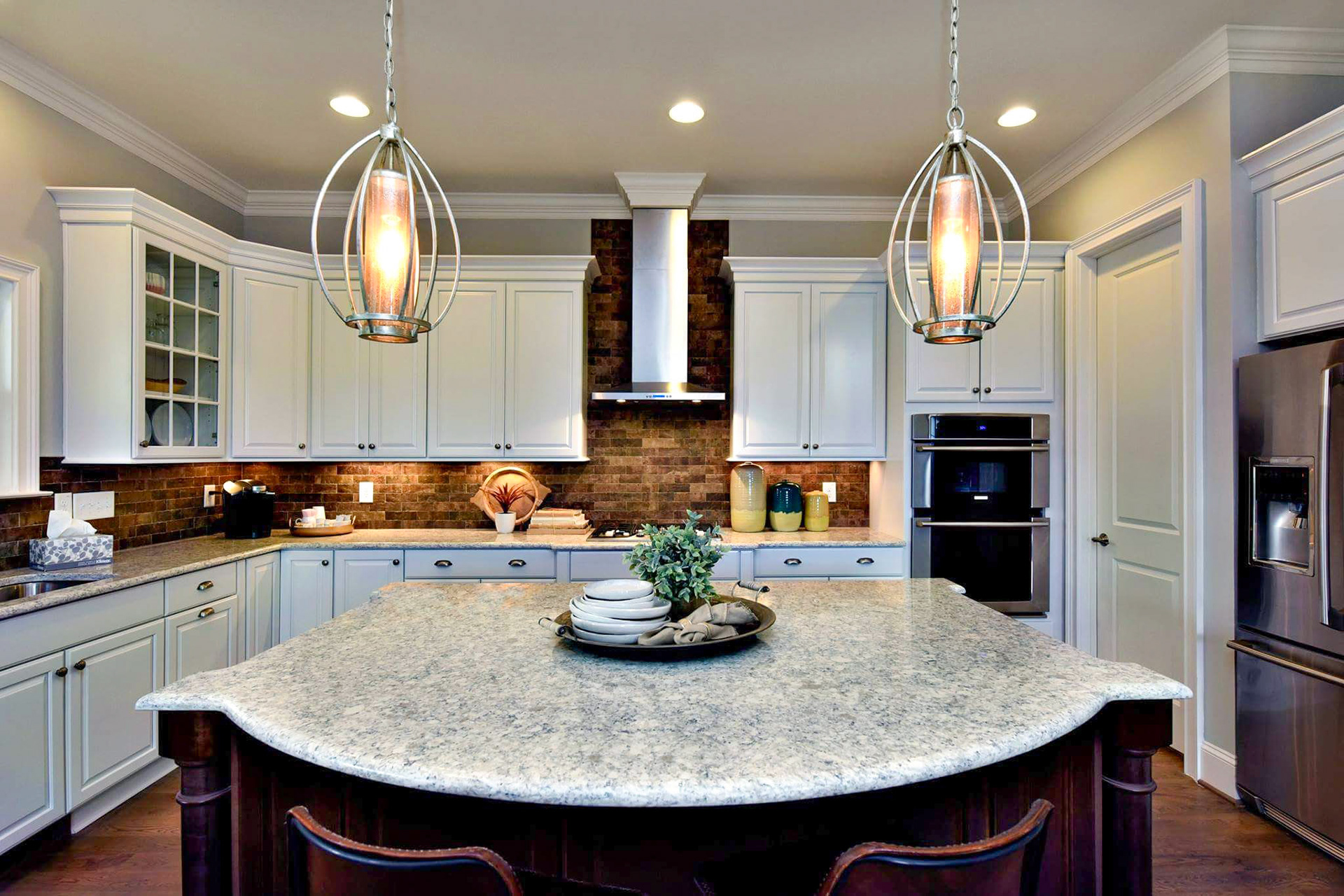 Personal Selections: Tile, flooring, and lighting. Other selections made by Merchandising Concepts. Photo Credit: Stanley Martin Homes.