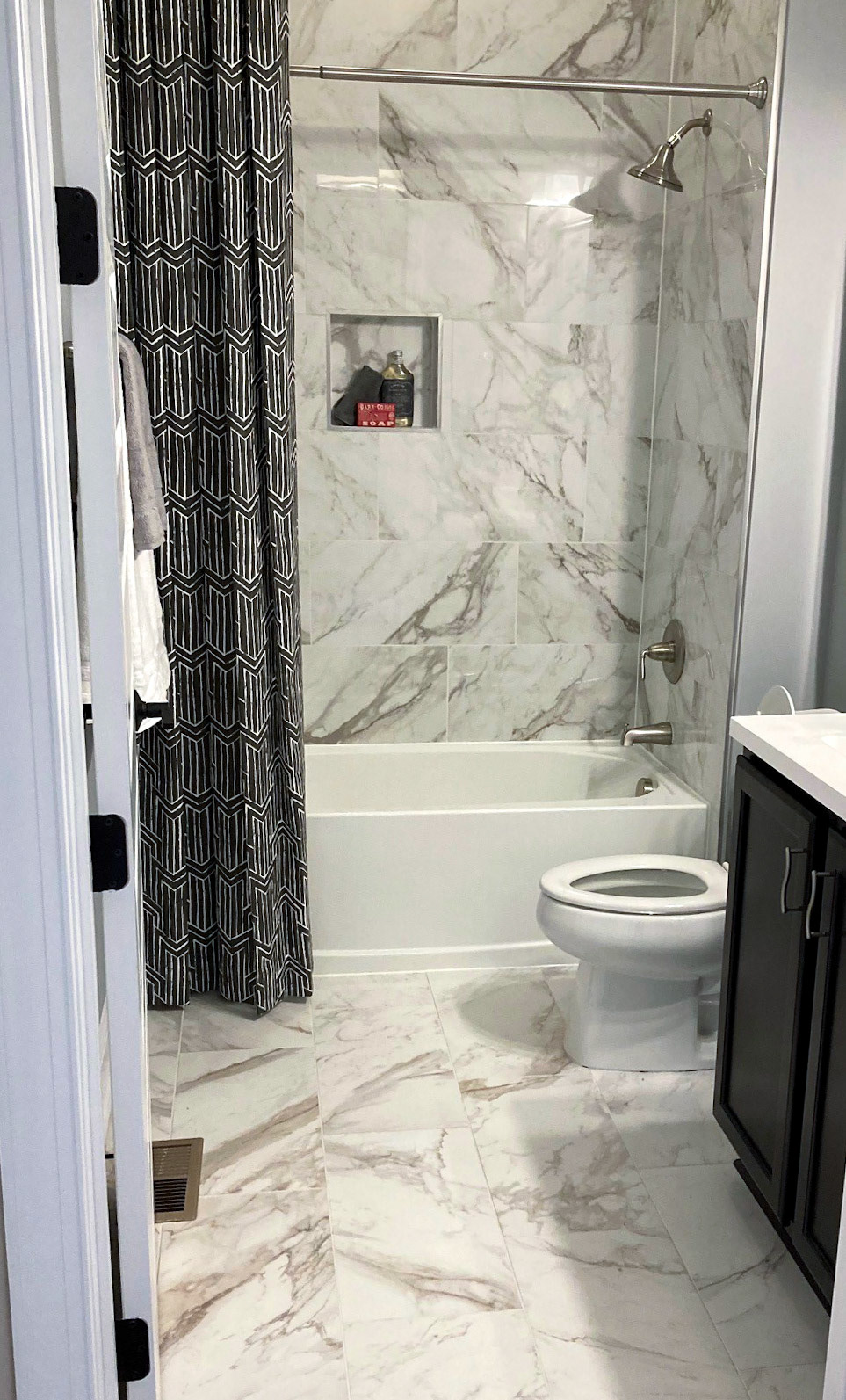 Personal Selections: Tile & lighting. Other selections made by Model Home Interiors.