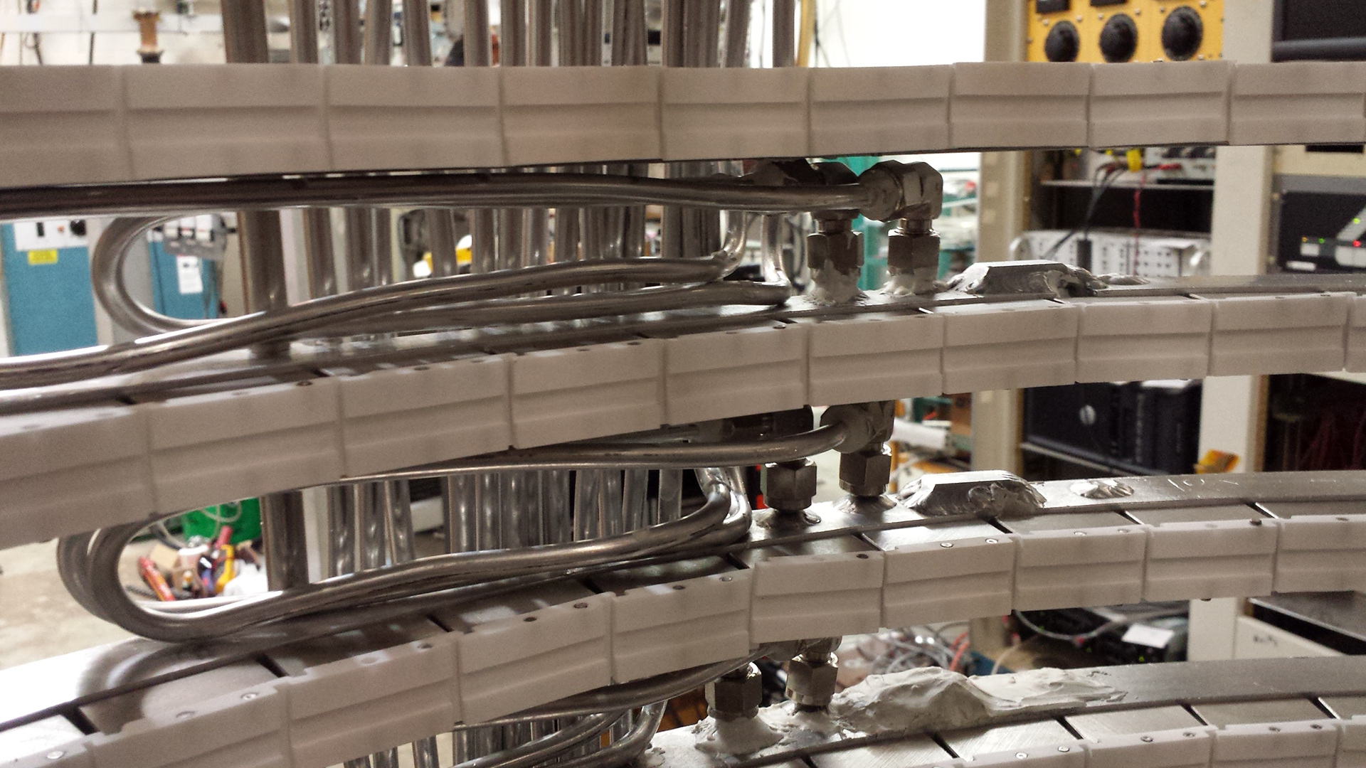 Water cooling lines that run to each extruded ring.