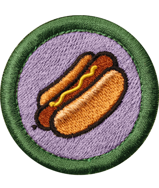 Events magazine: hot dog badge