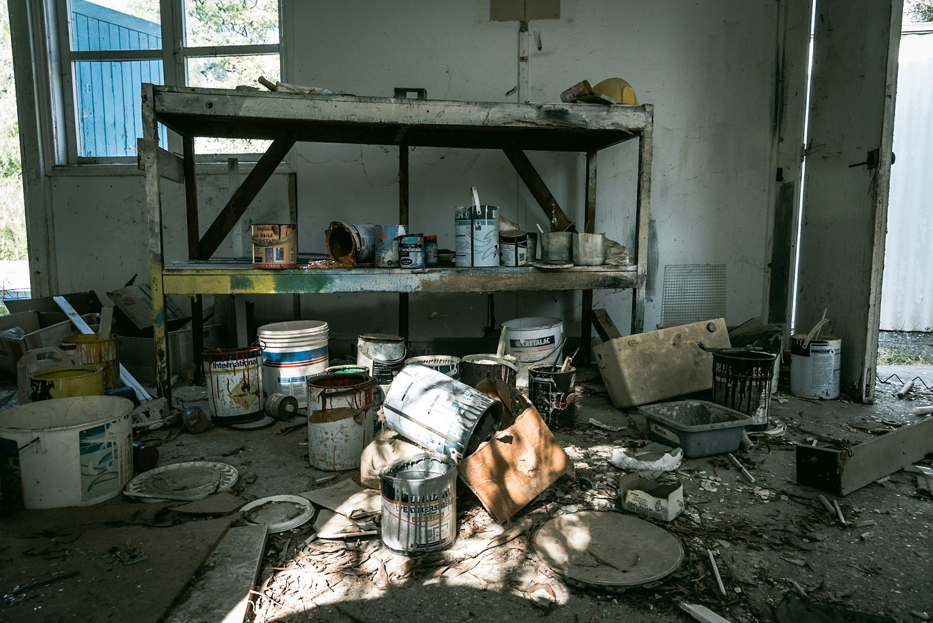 Paint buckets at the abandoned Berengaria Village in Limassol, Cyprus