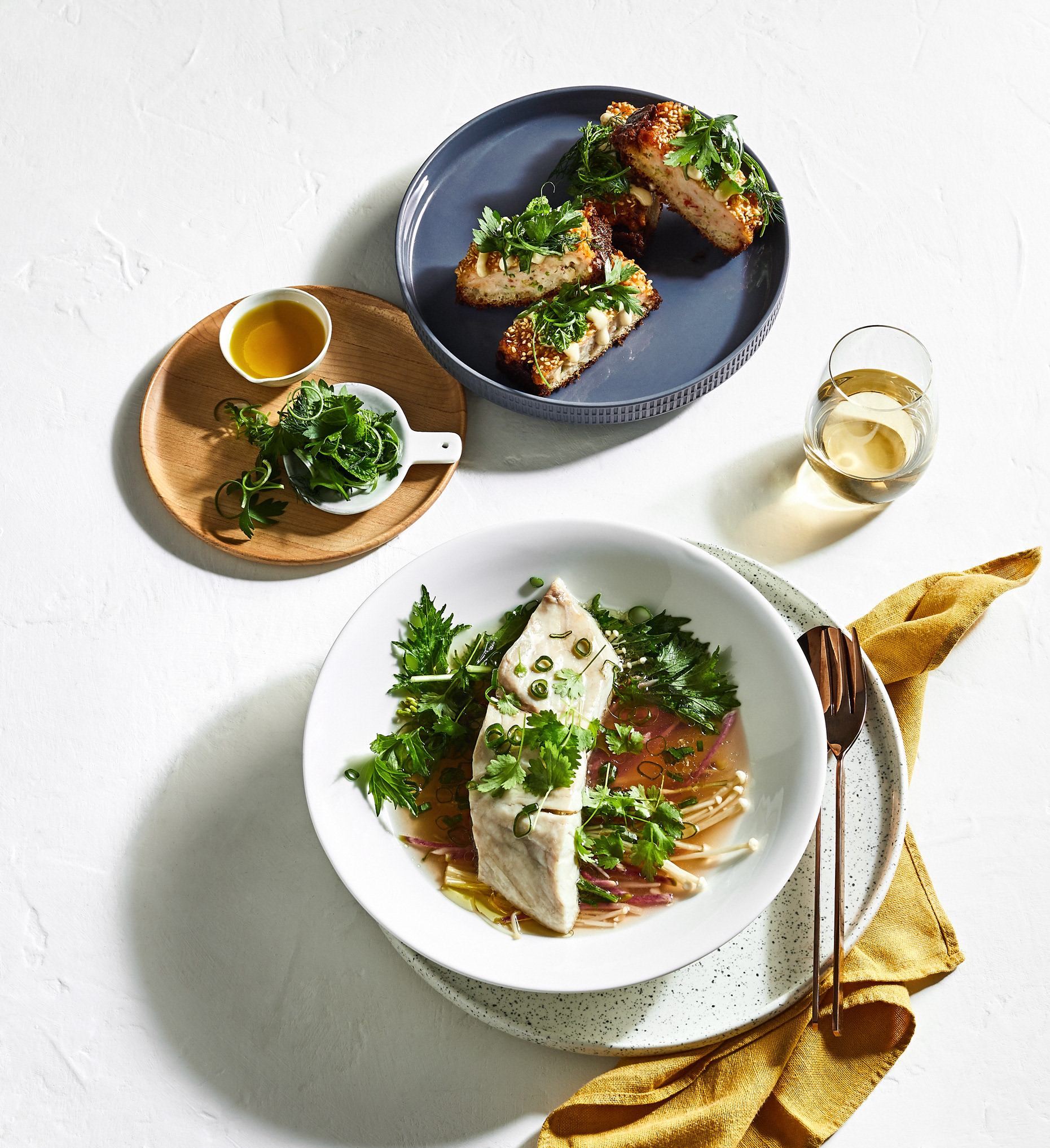 Prawn Toast with Yuzu mayonnaise and mixed herbs. Steamed fish with enoki, radish, mizuna & ginger nage