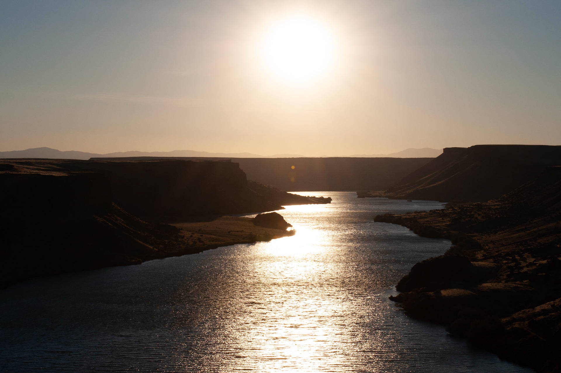Sunset: Snake river, sun is setting, 20200926, Box Canyon Snake River Idaho, Miller, Sam took me out on a mini date to this spot and I capture several sunset shots, the shutter speed is what i focused on the most to get a balance to show shadow on the canyon walls and not over expose the water or sun as my camera was pointed directly into the light source. Camera Settings: Nikon D500 ISO 200, 55mm, f/16, 1/500s