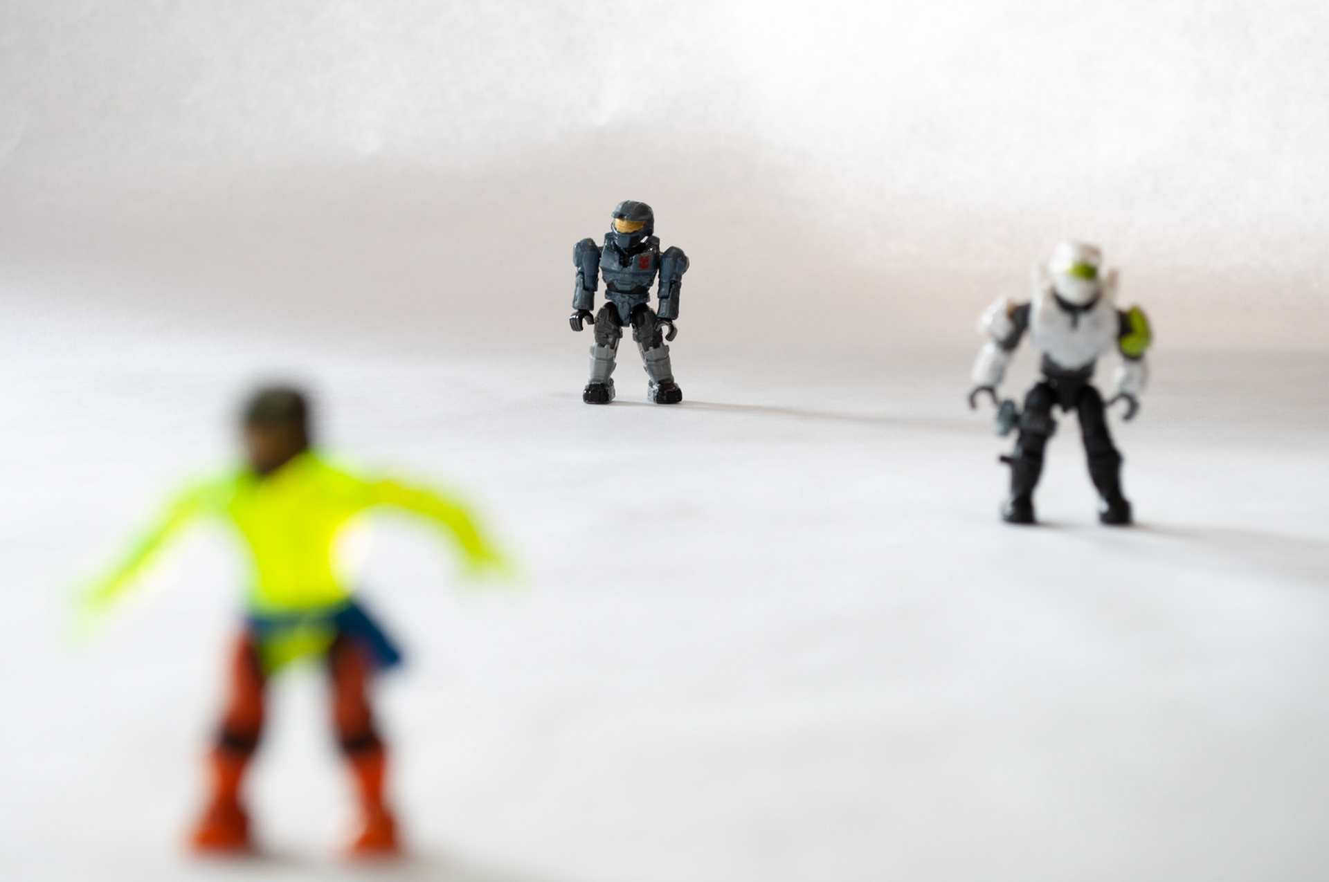 Background Focus 1: Blue Figure, Focusing on the background figure in 1/4 F8, 20200925, Kitchen table, Miller, Out of the 12 background focus pictures I took this had the most detail and focus on the far figure. Camera Settings: Nikon D500, ISO 100, 55mm, f/8, 1/4s