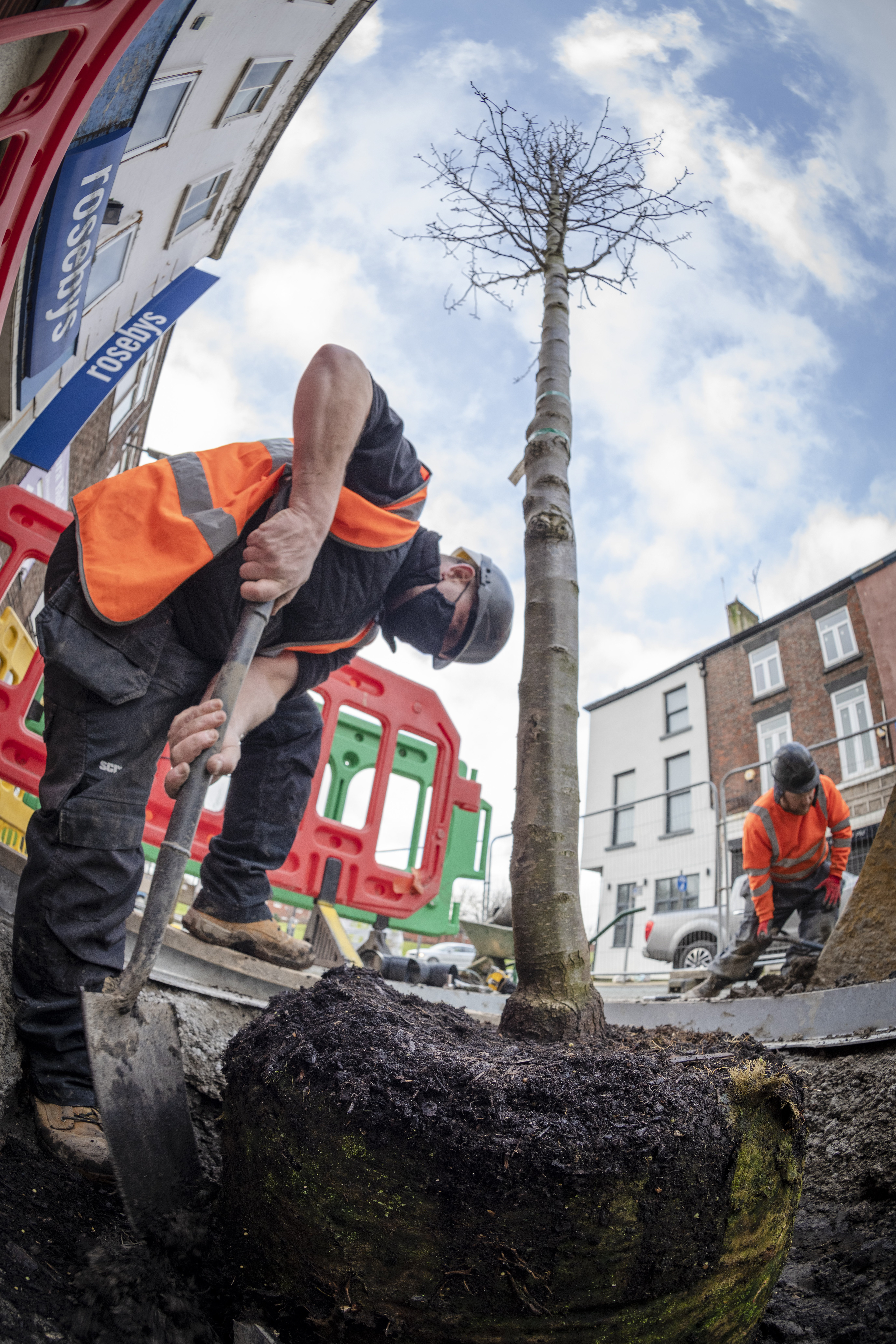 Delivering despite the challenges: The Mersey Forest delivers on a number of nature-based solutions across the city. The Stafford Street project based within Liverpool’s Fabric District forms part of the European Structural and Investment Funds to deliver on low carbon solutions. The photo provides a snapshot of the pressures of COVID-19 and how work to install 29 large urban trees is still ongoing. Photo by McCoyWynn.