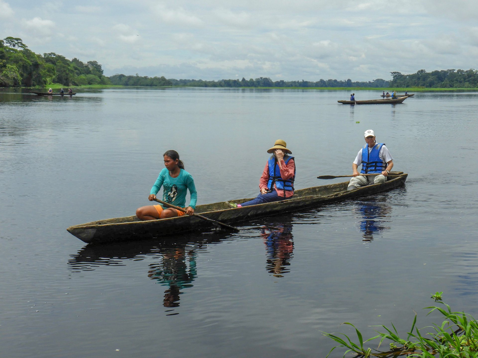 Paddling dugout canoes